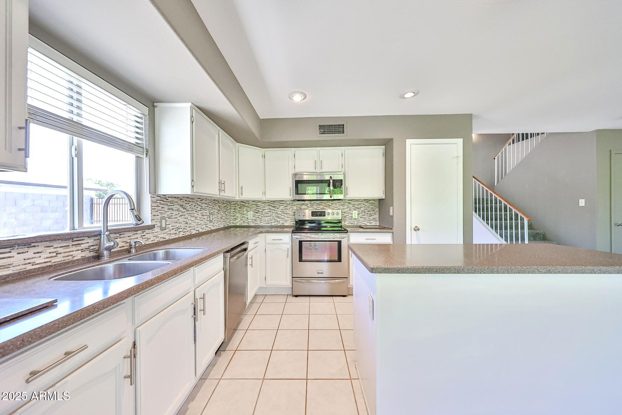7726 W CHERYL Drive