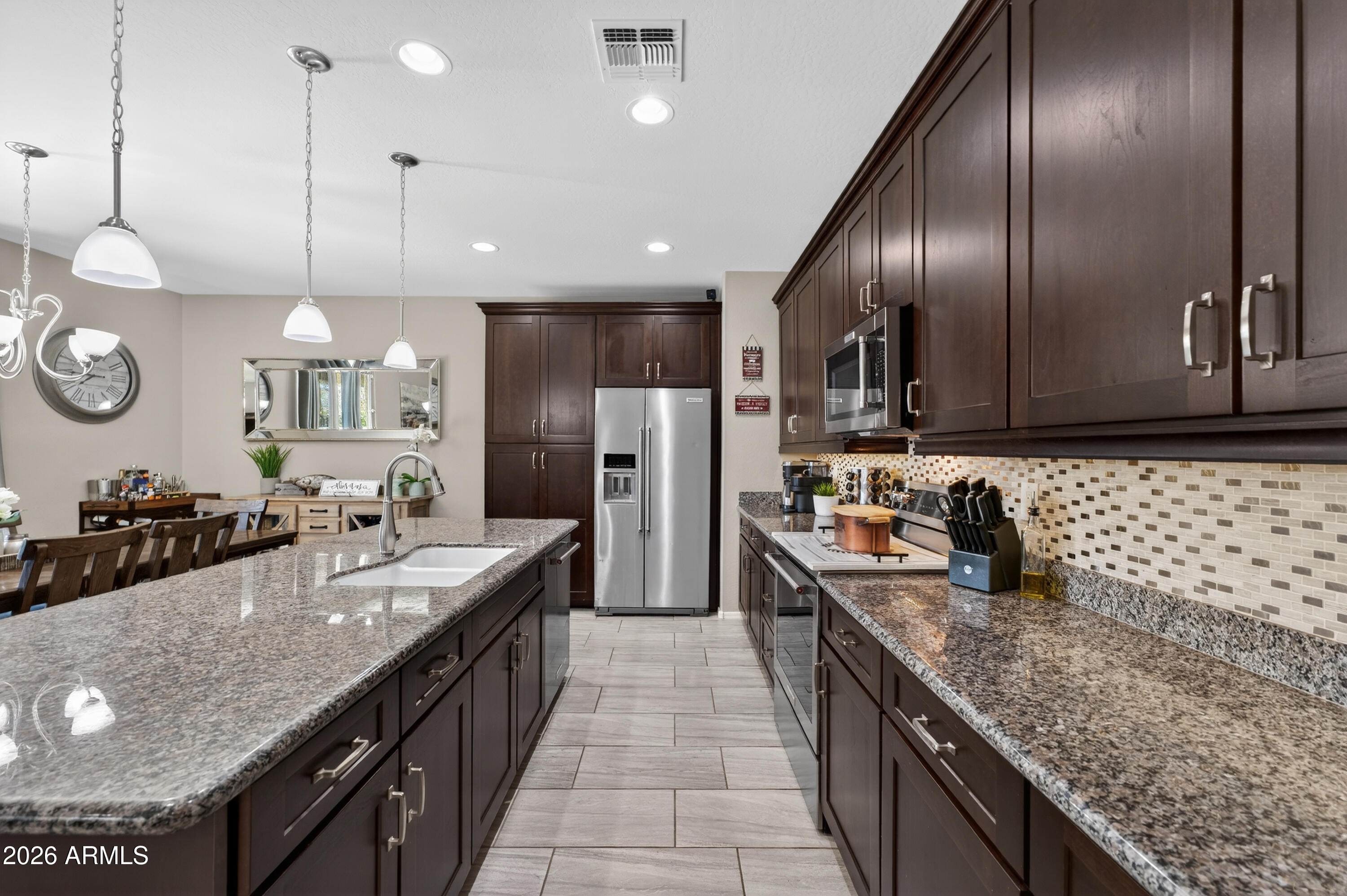 12065 W ROWEL Road