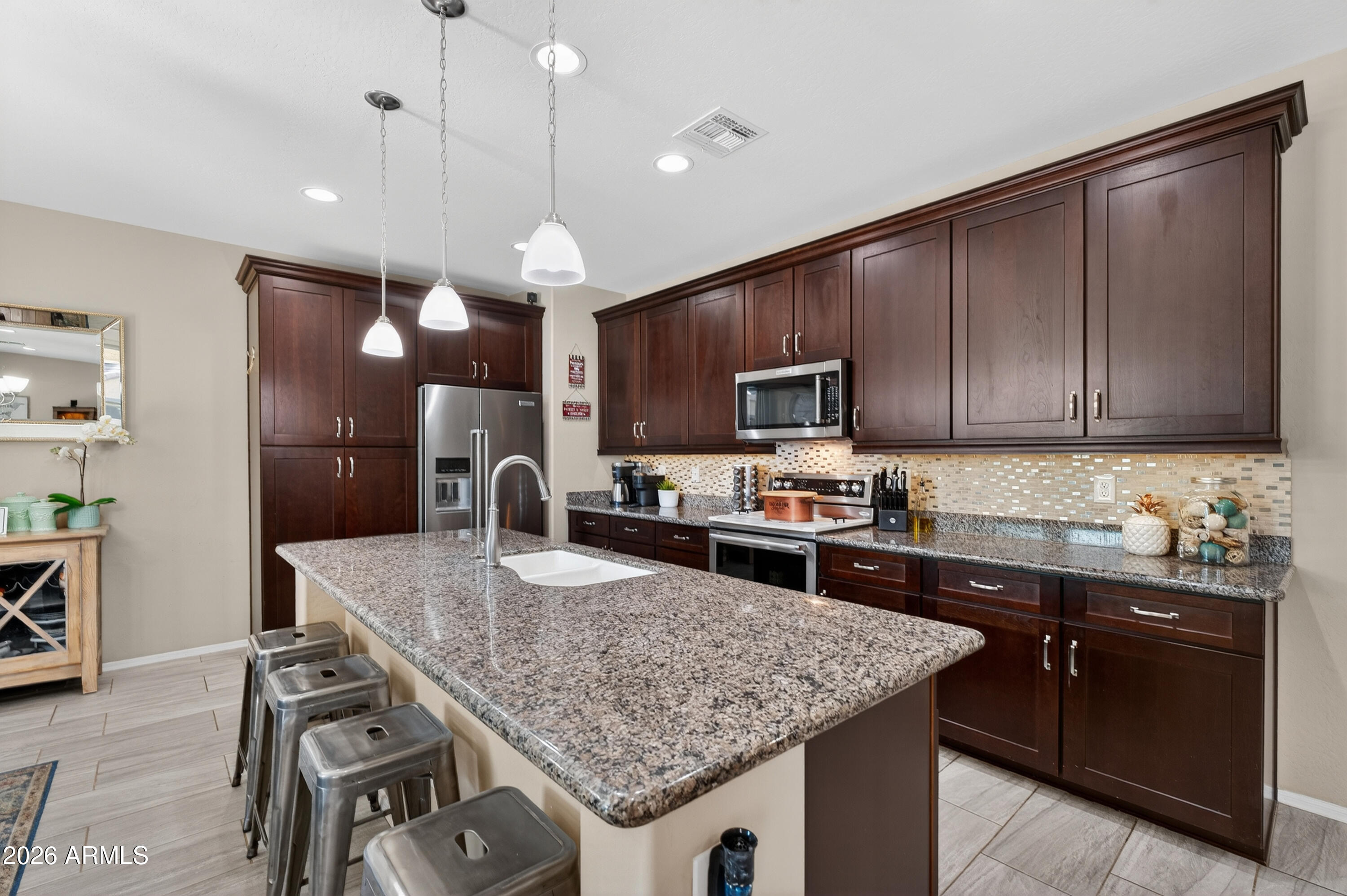 12065 W ROWEL Road