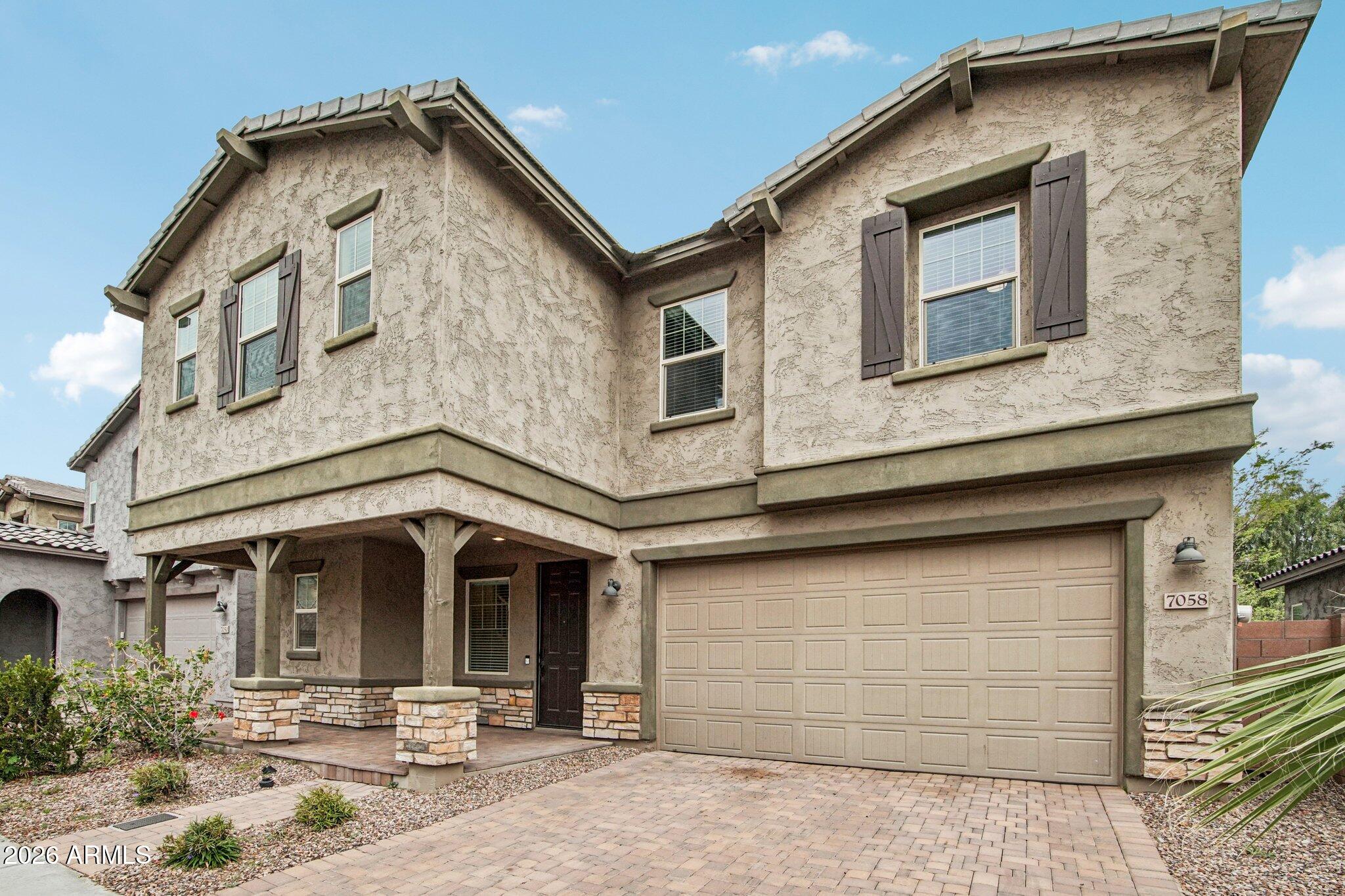 7058 E AINSLEY MAY Way