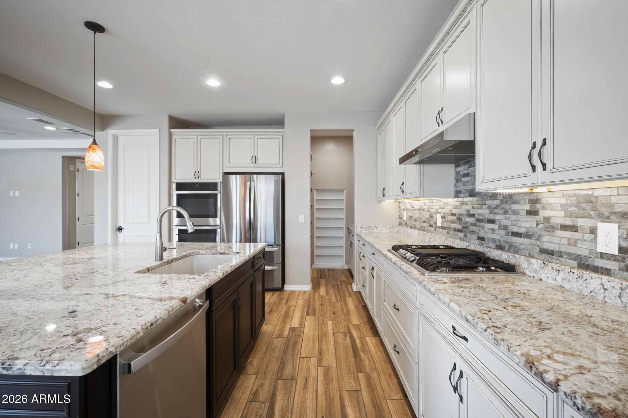 12512 W LAMAR Court