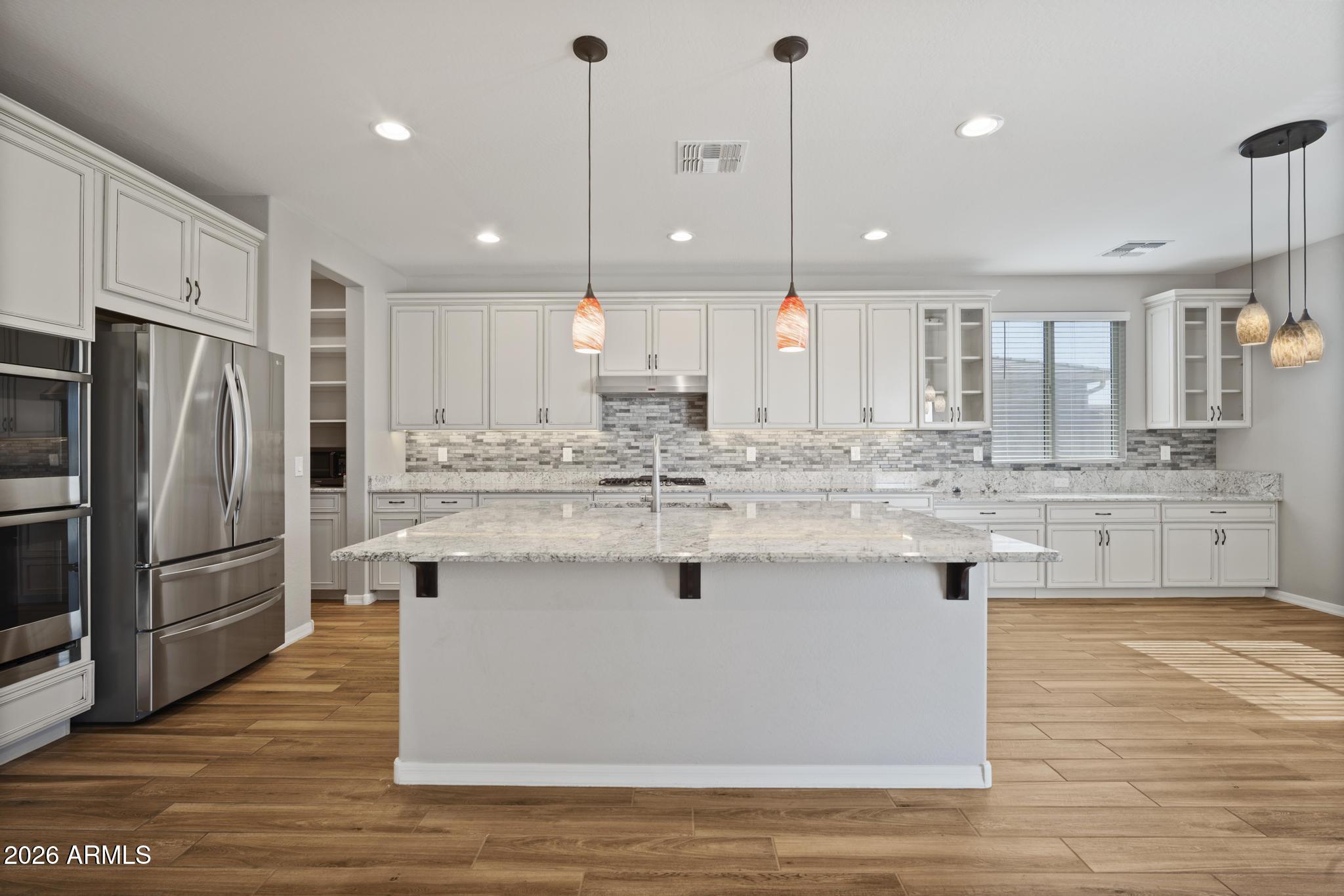 12512 W LAMAR Court