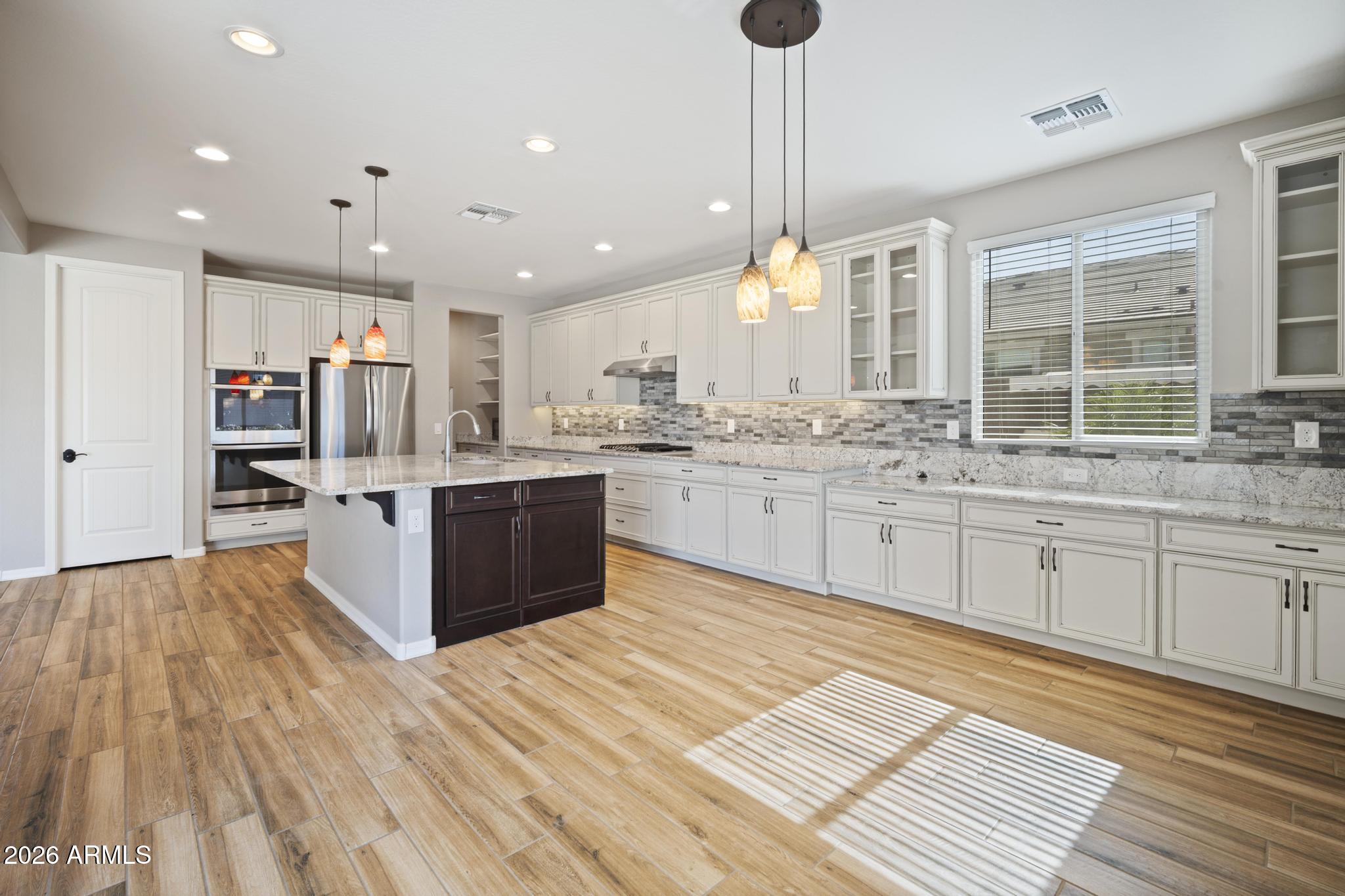 12512 W LAMAR Court