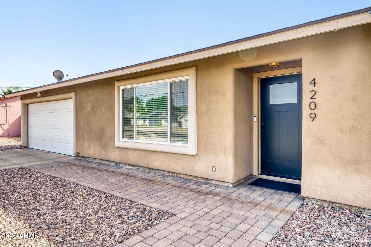 4209 E ACOMA Drive