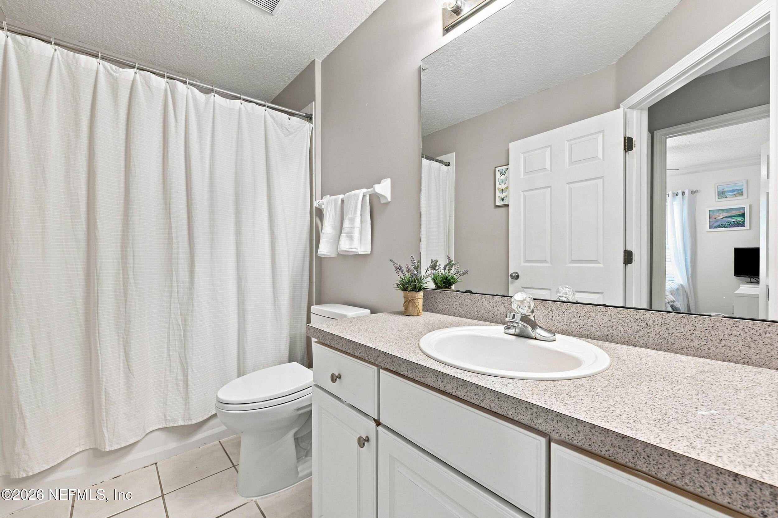 616 E TROPICAL Trace, St. Johns