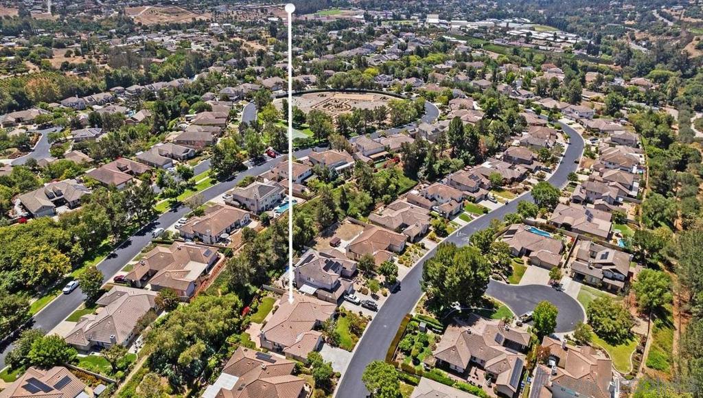 Aerial view of 672 Inverlochy Drive, marked among surrounding homes.