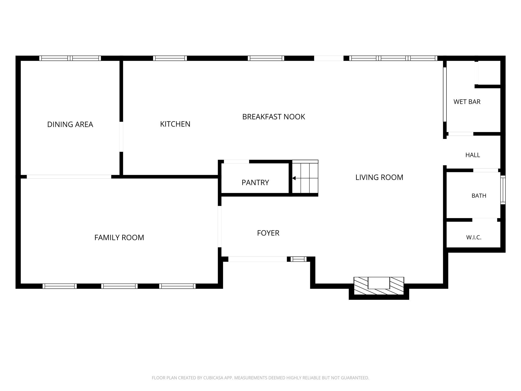 Floor plan labeling the home's kitchen, dining and living areas, family room, pantry, wet bar, bath, and foyer.