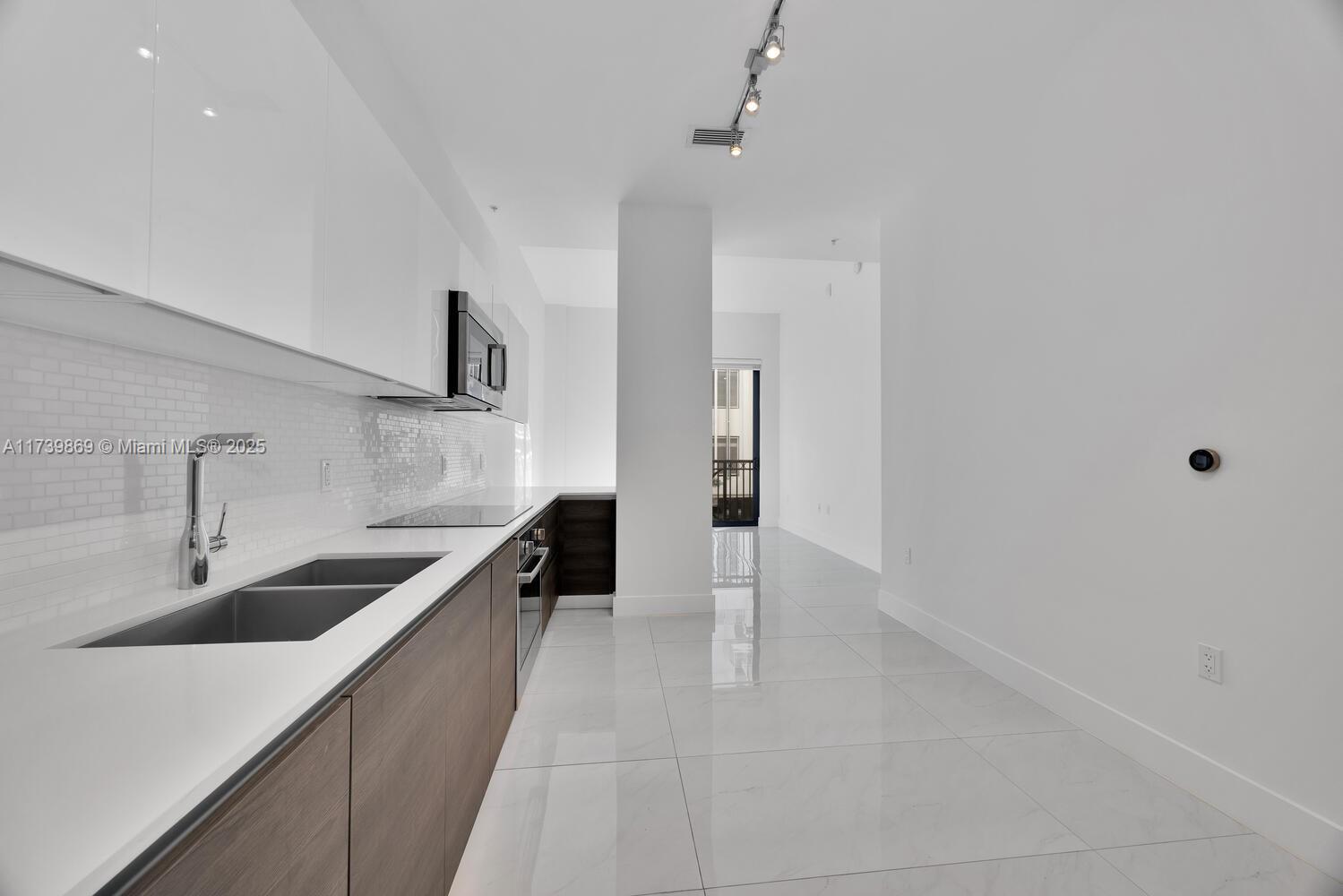301 Altara Ave # 201