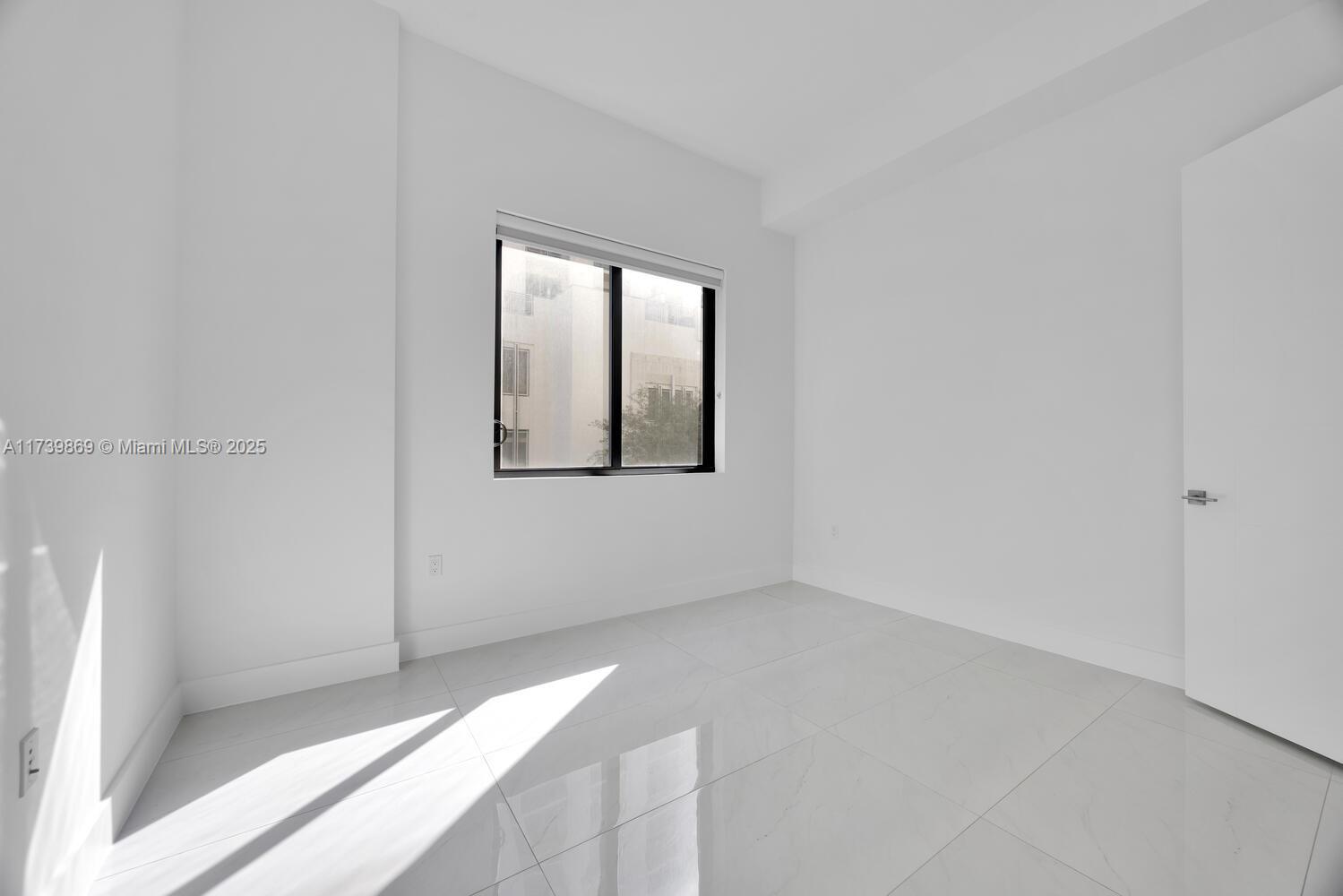 301 Altara Ave # 201