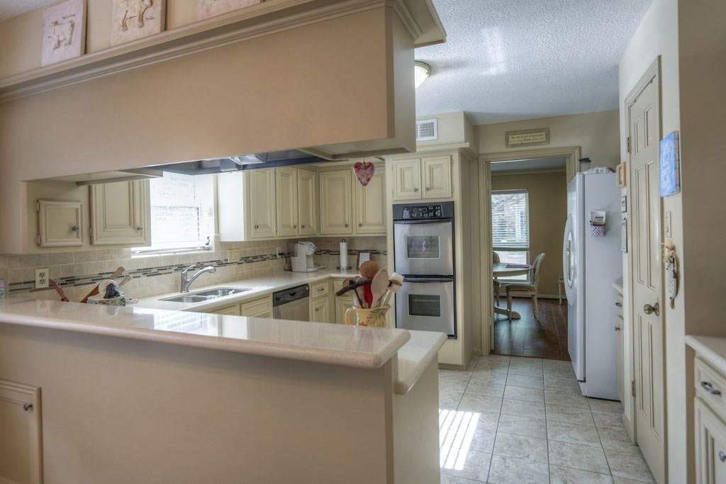 12439 Piping Rock Drive