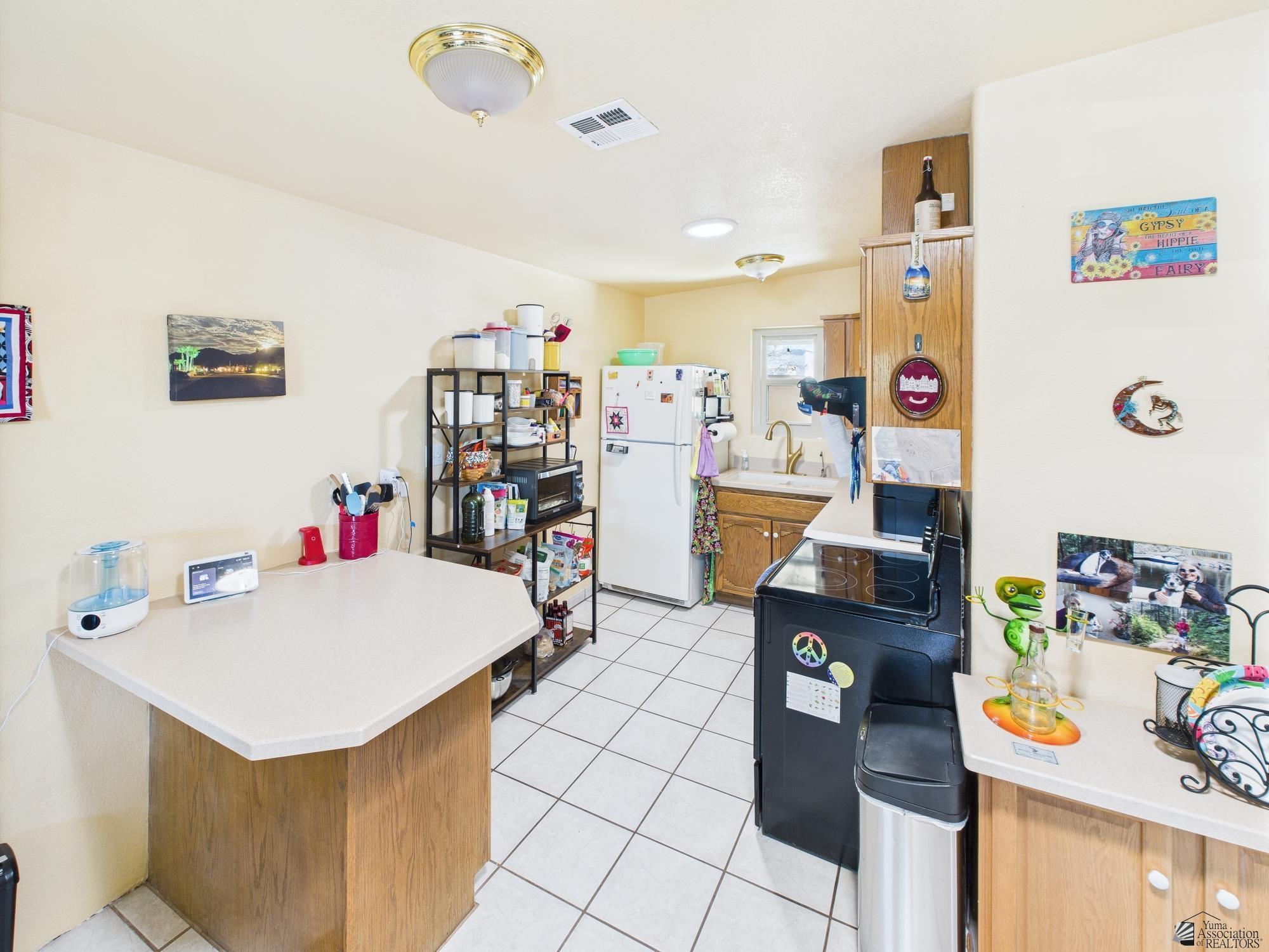 13822 E 53 Dr