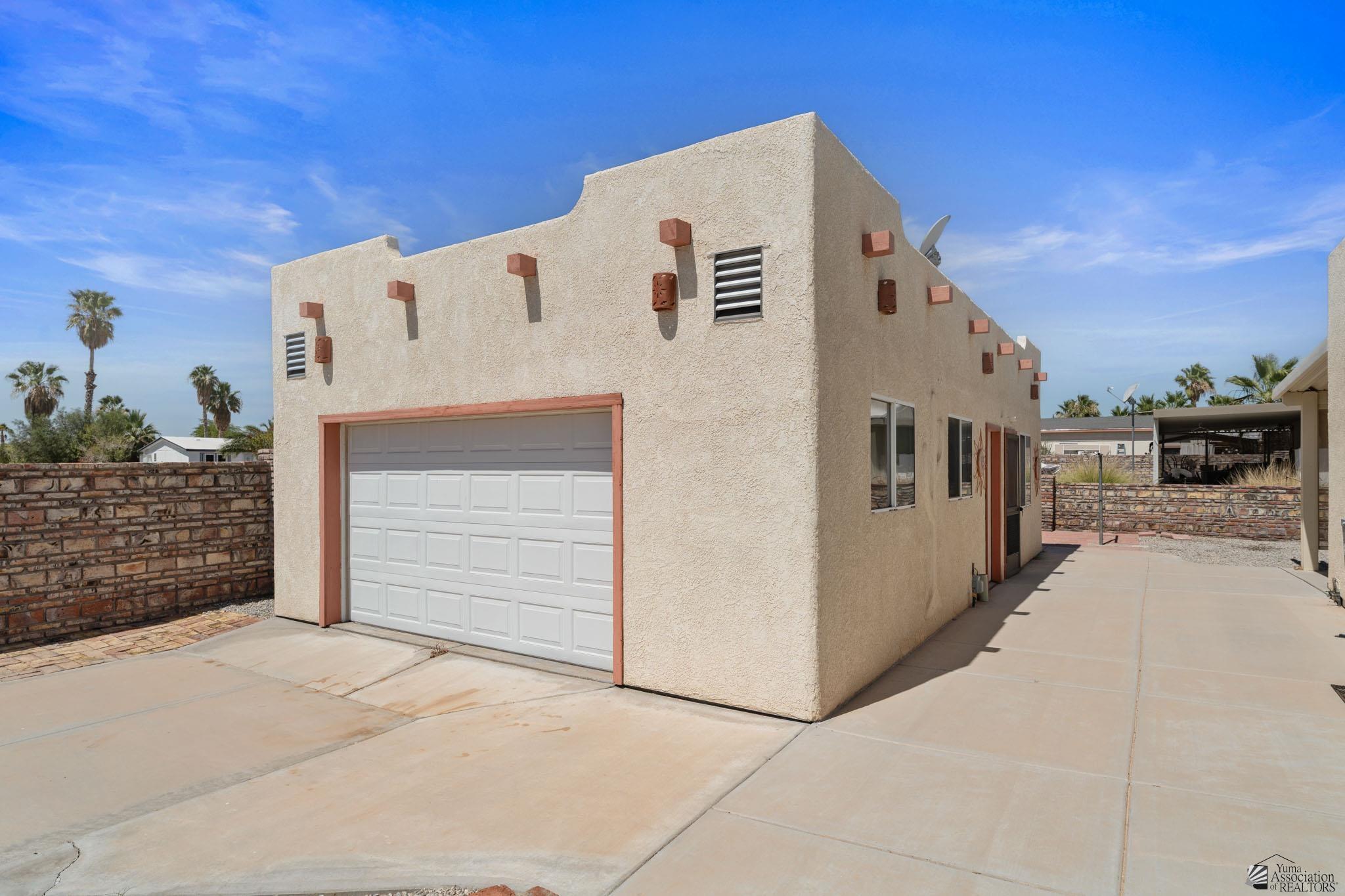 13317 E 53 Dr