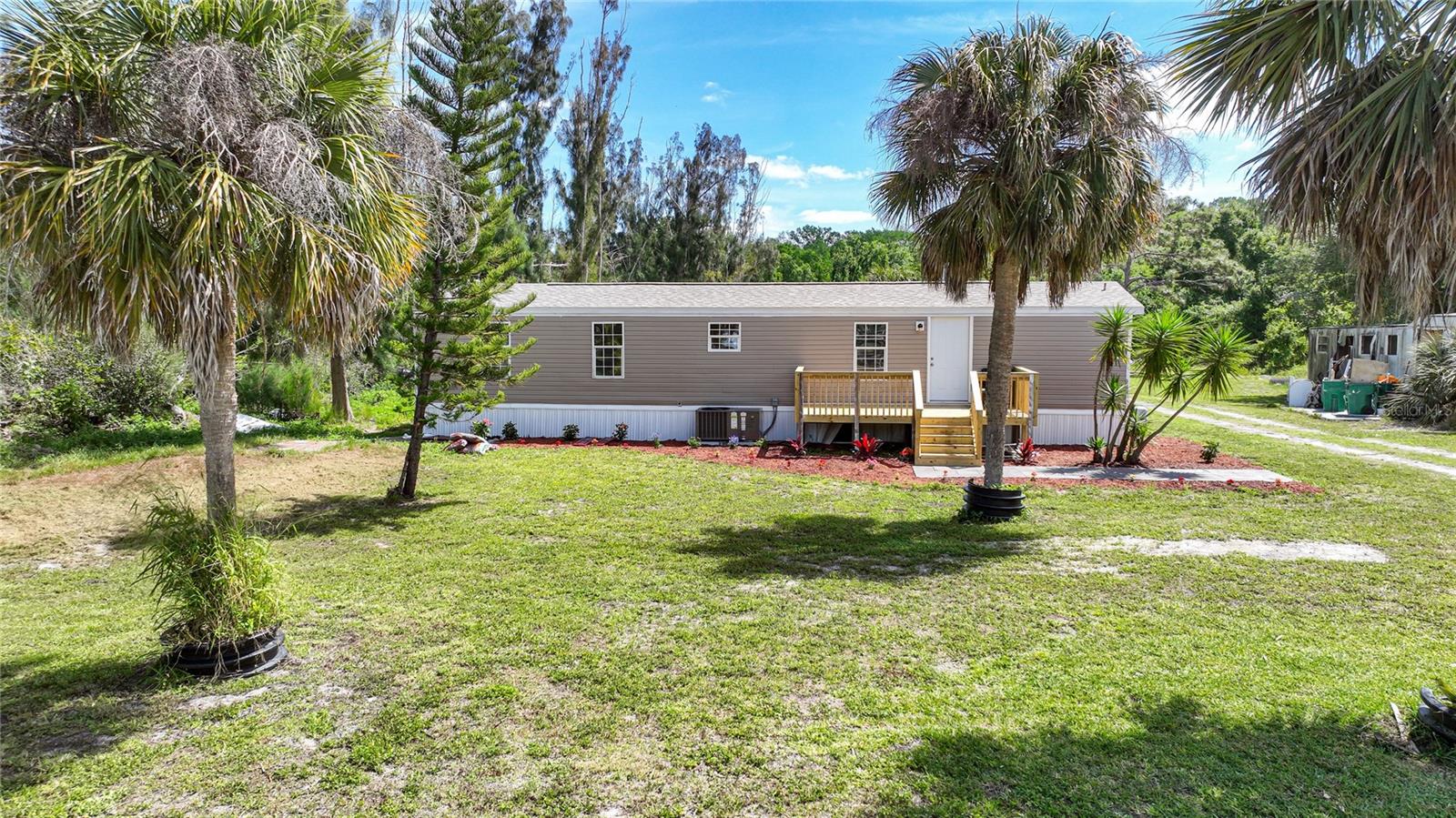 5582 SWAYING PALM DR