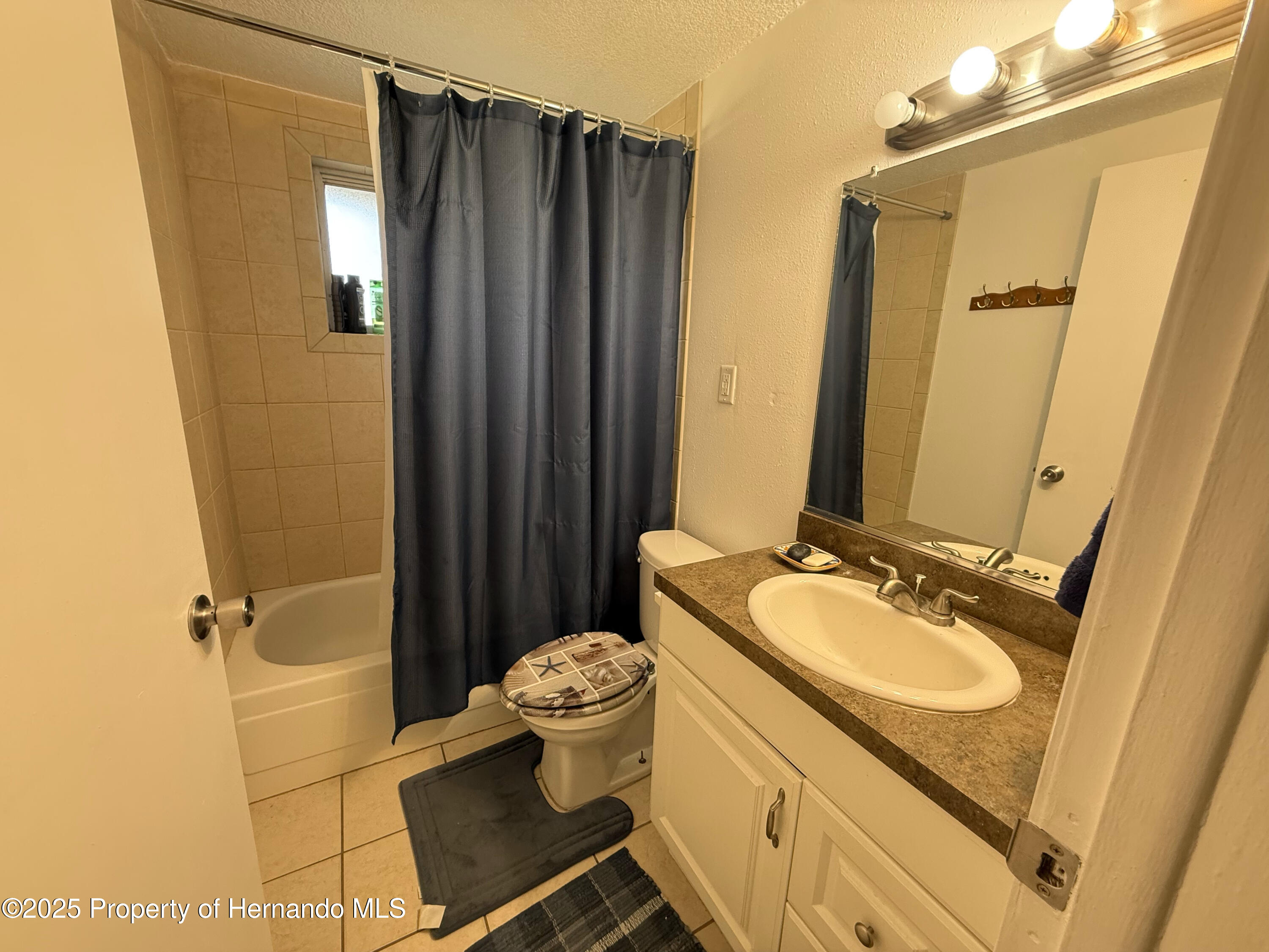 5791 W Holiday Street