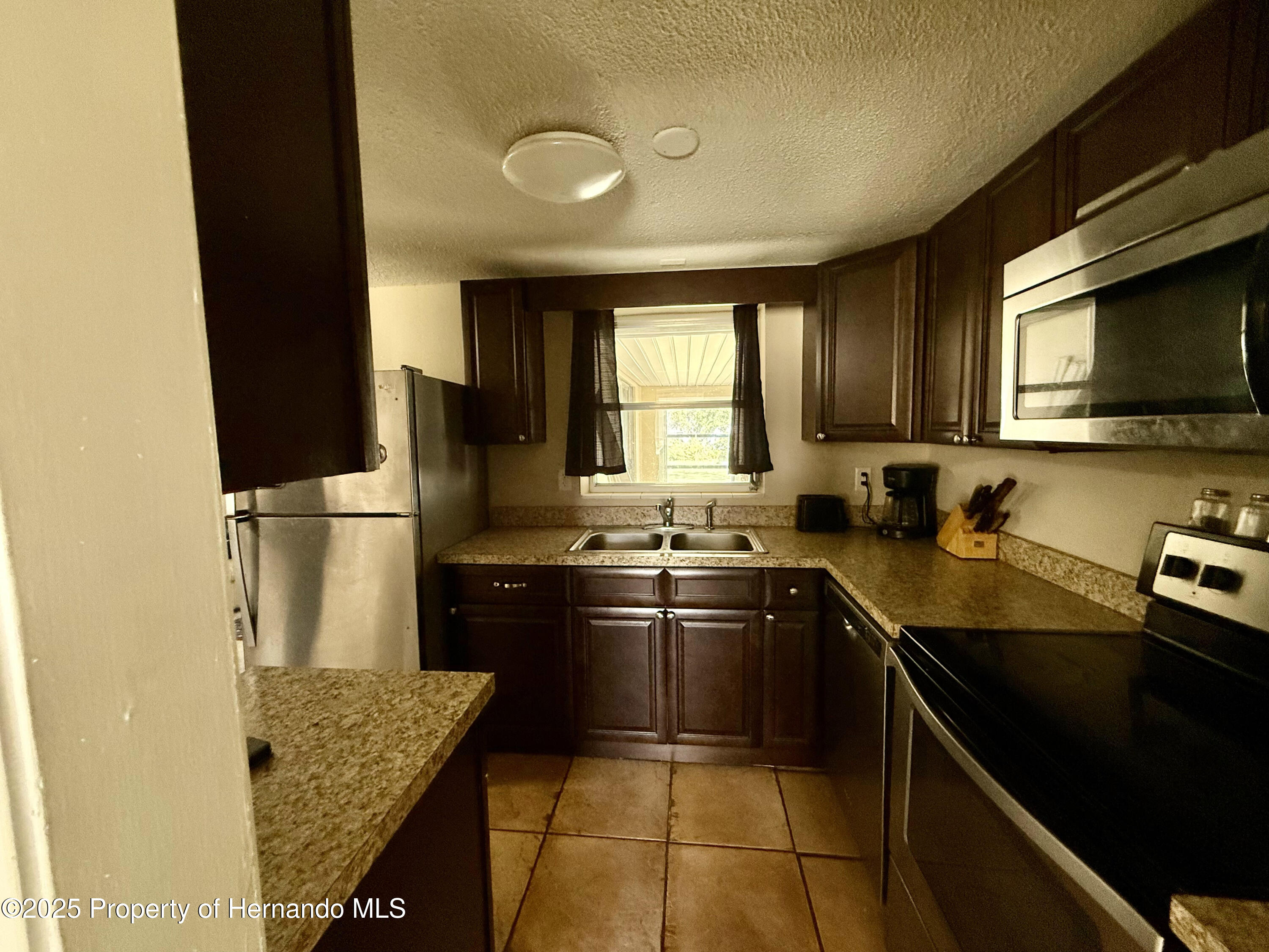 5791 W Holiday Street