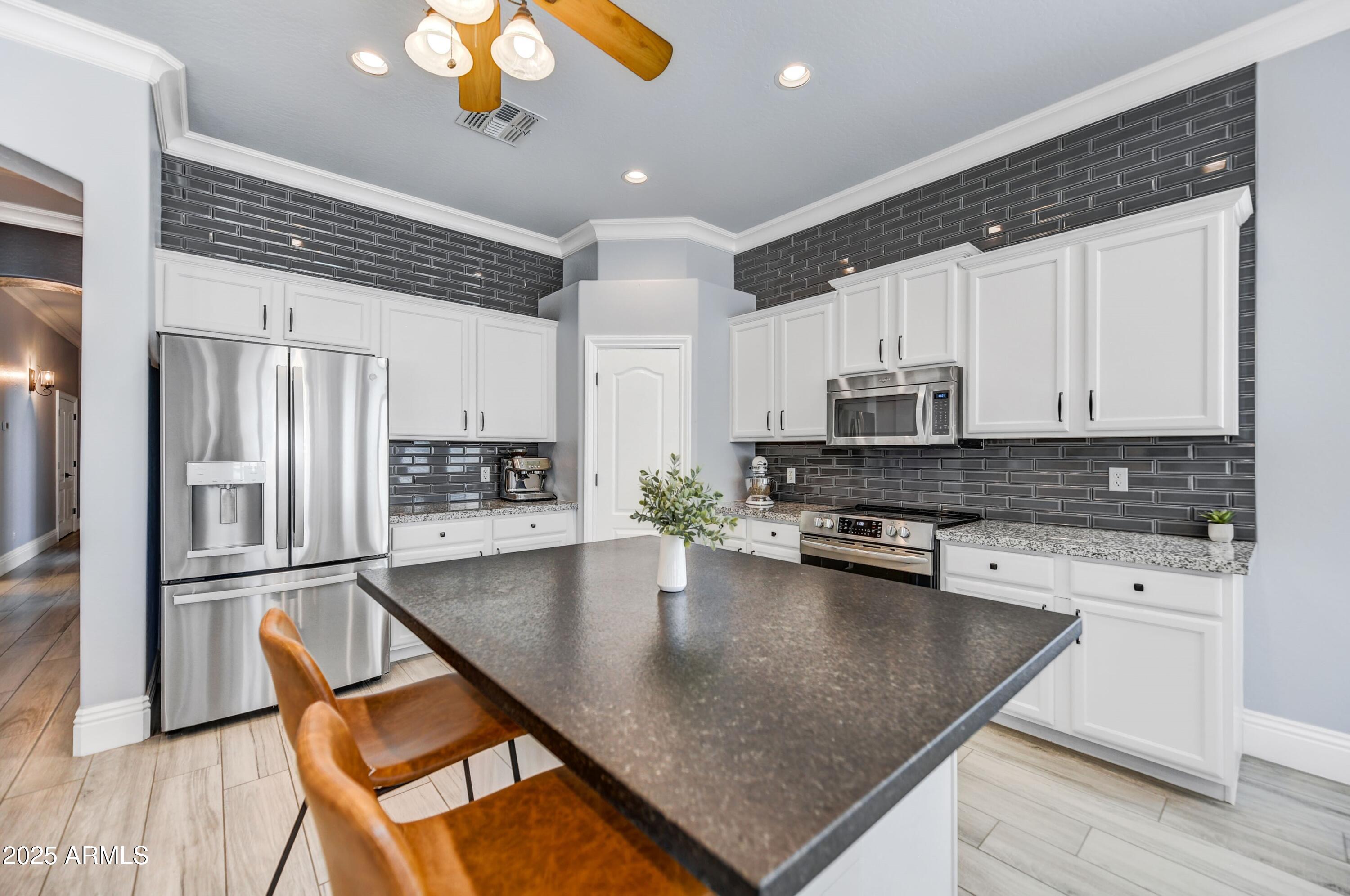 5537 E DUSTY WREN Drive