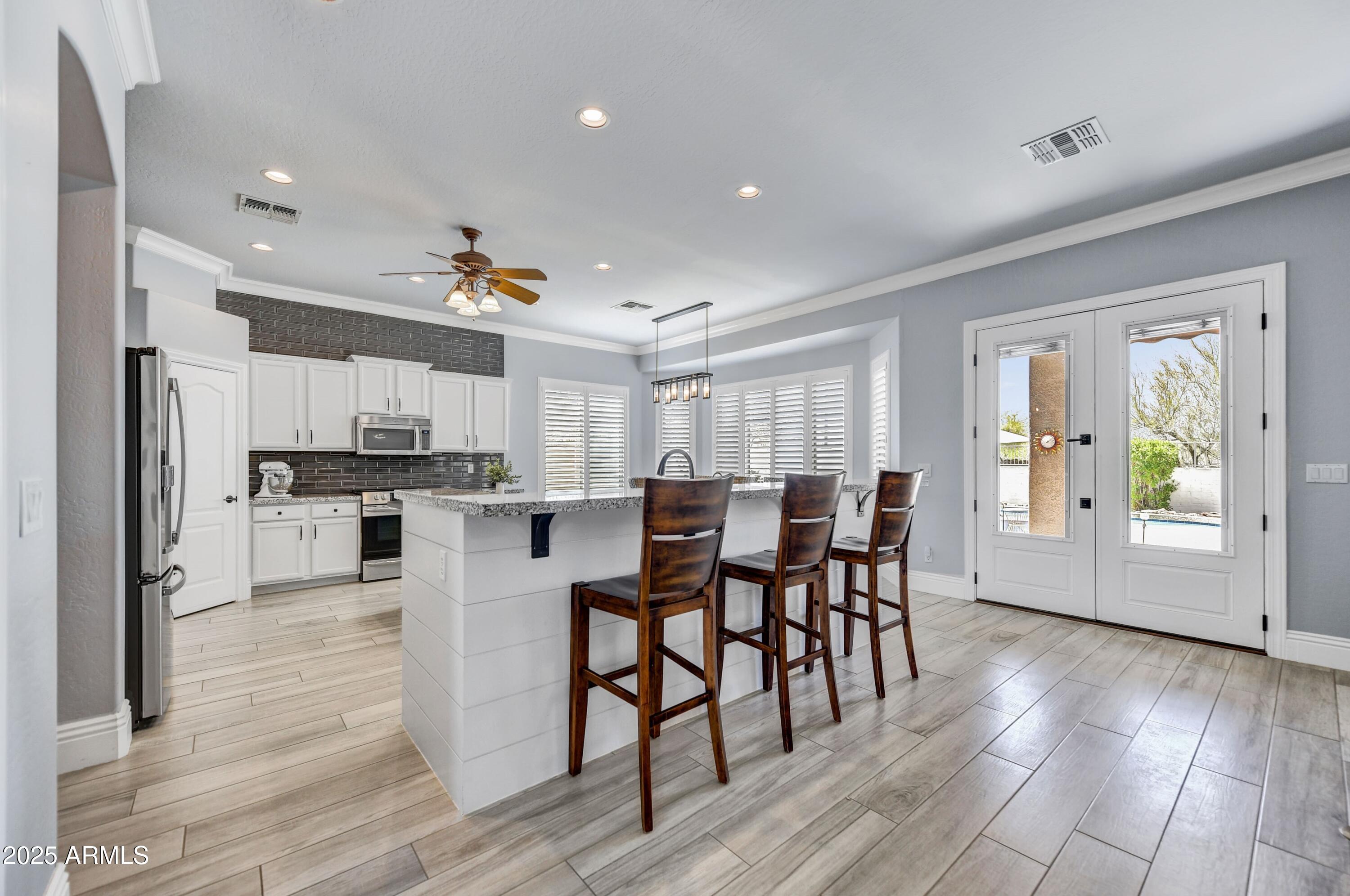 5537 E DUSTY WREN Drive