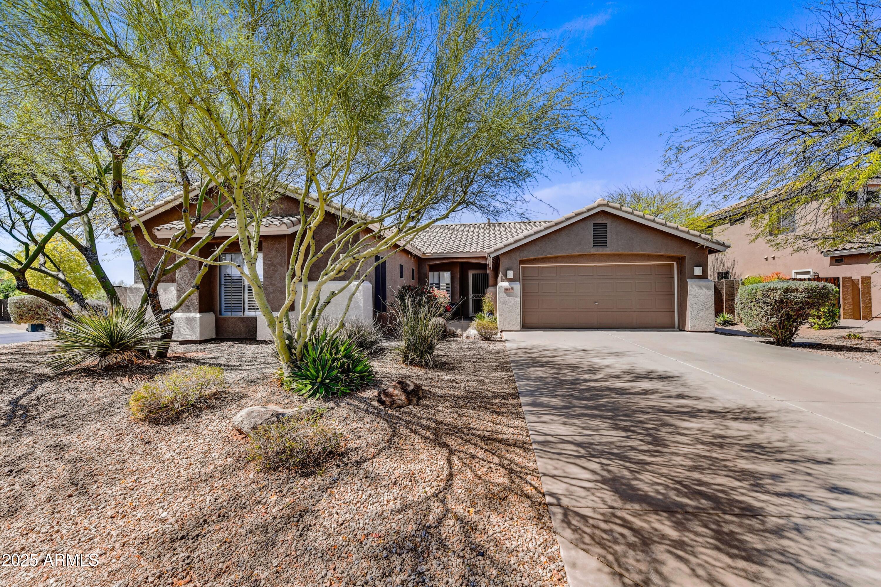 5537 E DUSTY WREN Drive