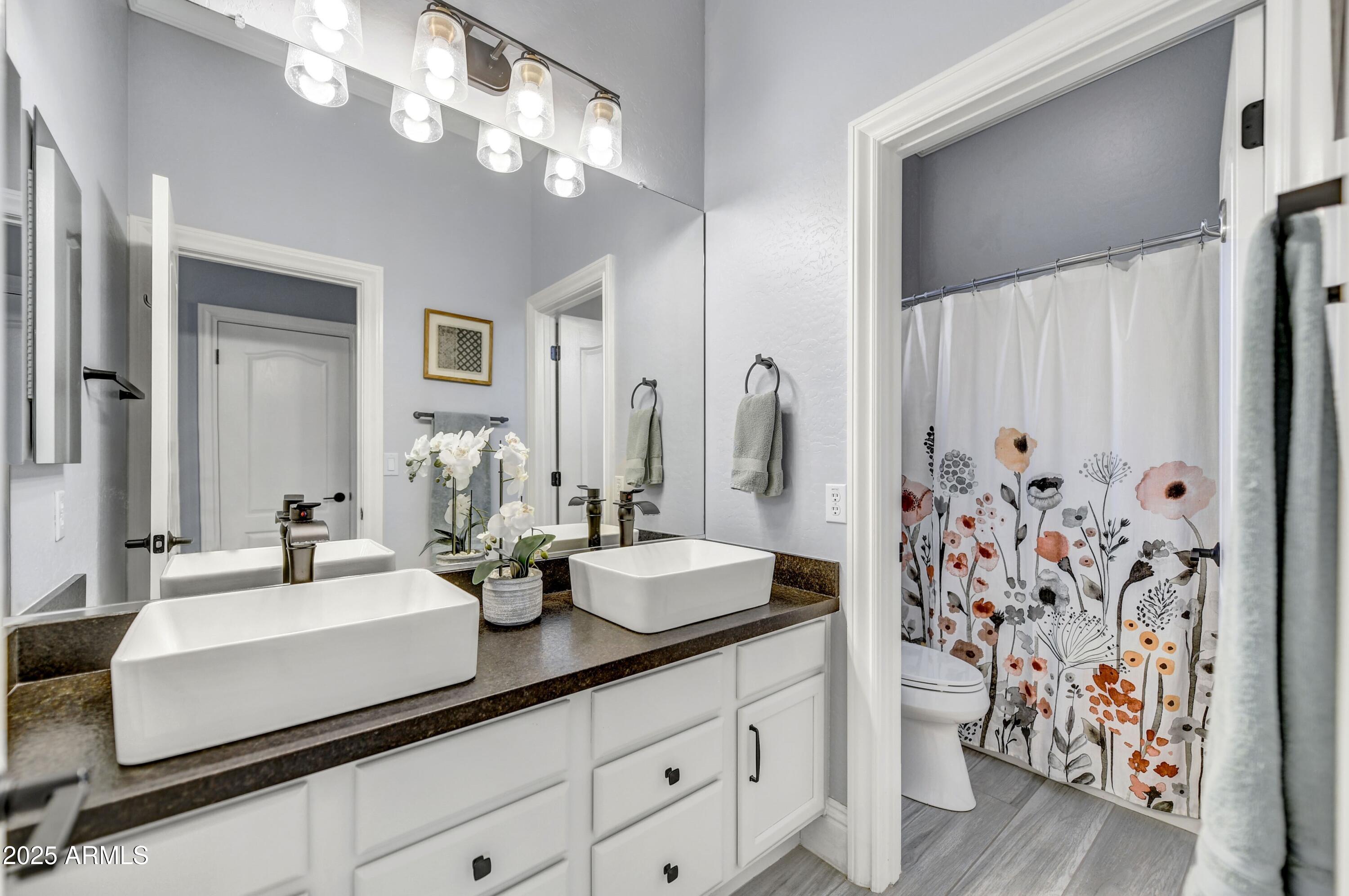 5537 E DUSTY WREN Drive