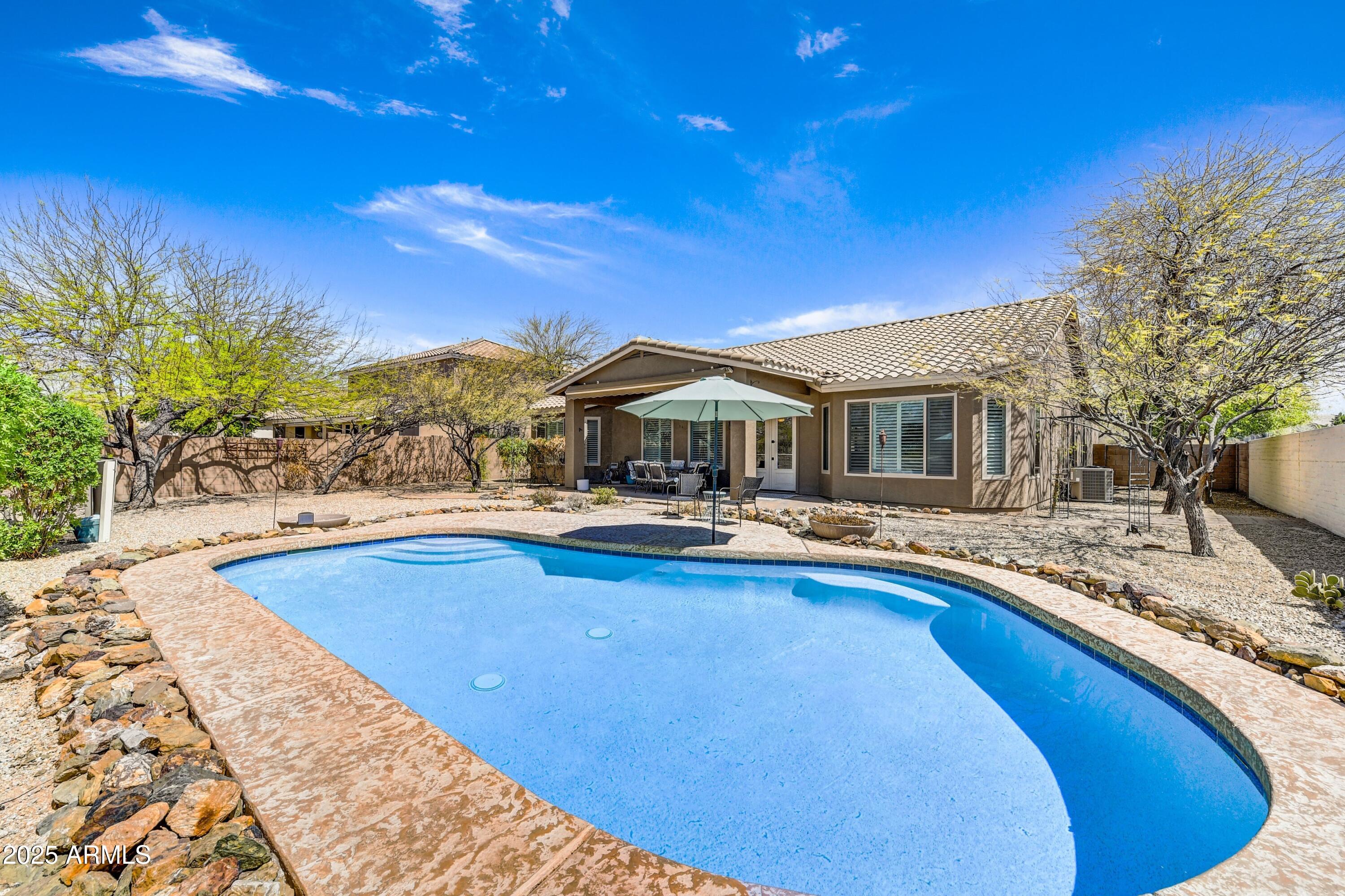 5537 E DUSTY WREN Drive