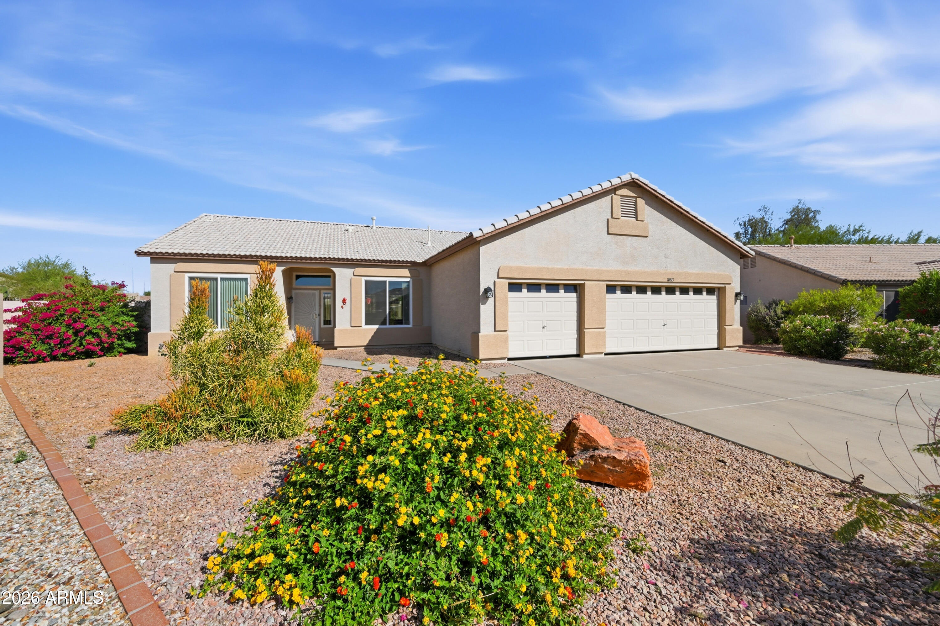 10873 W ORAIBI Drive