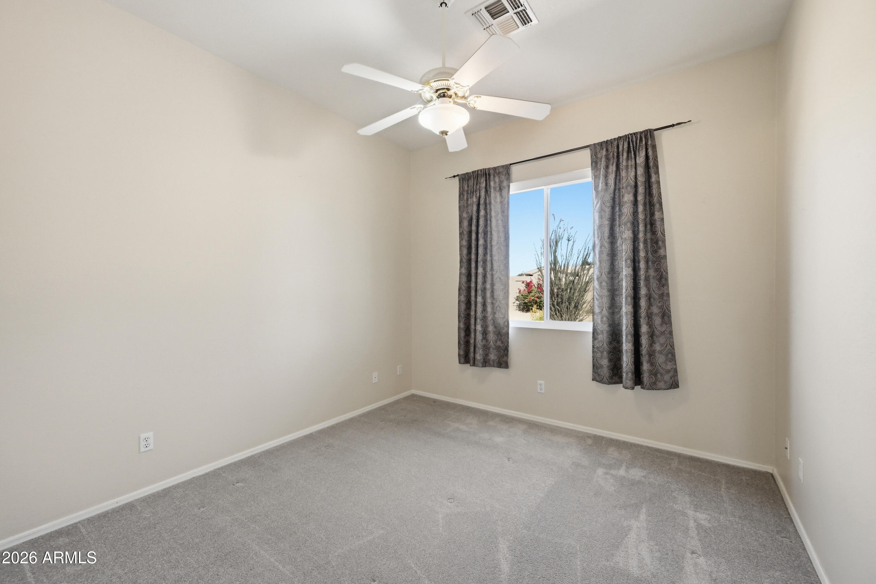 10873 W ORAIBI Drive