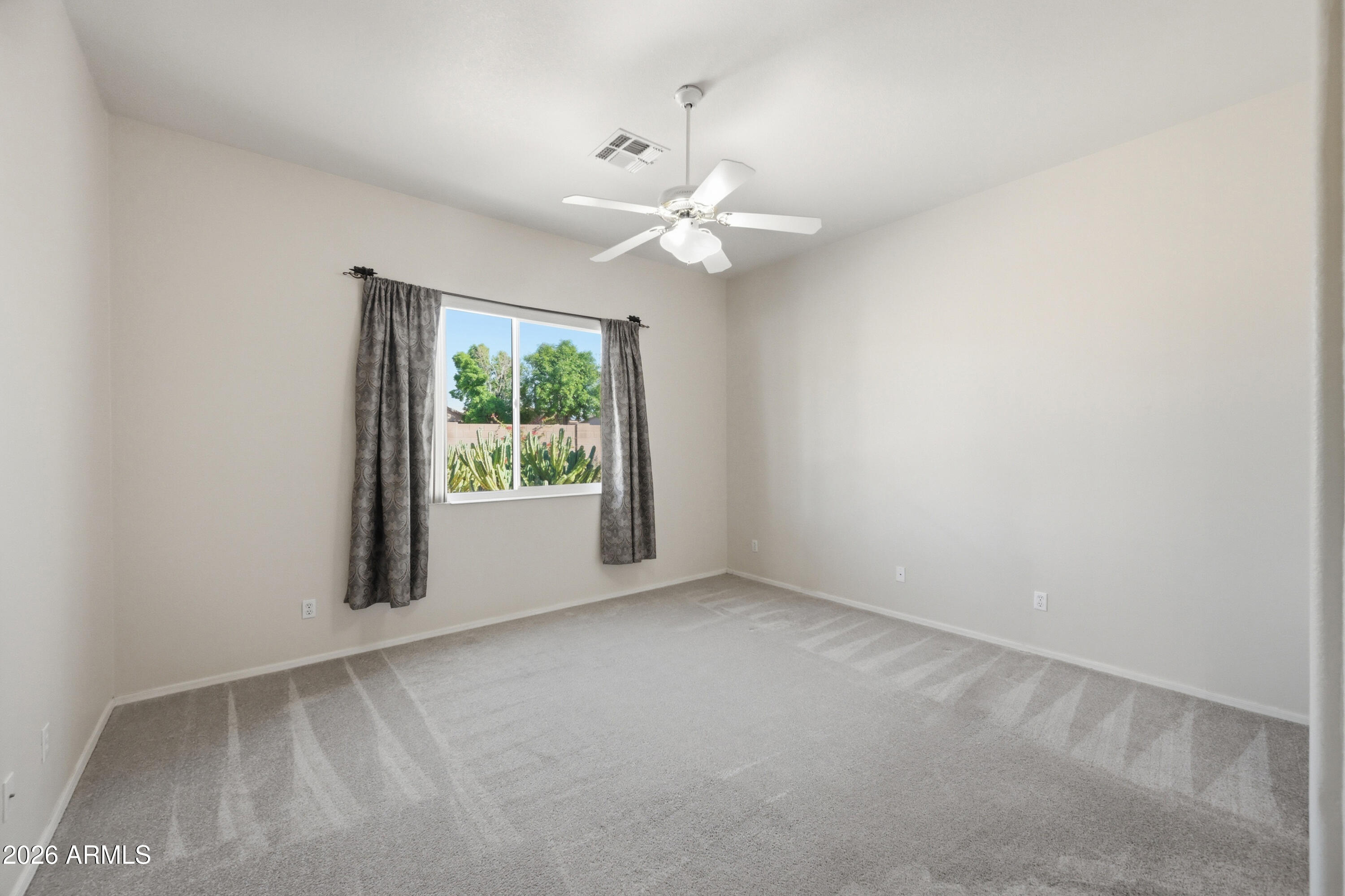 10873 W ORAIBI Drive