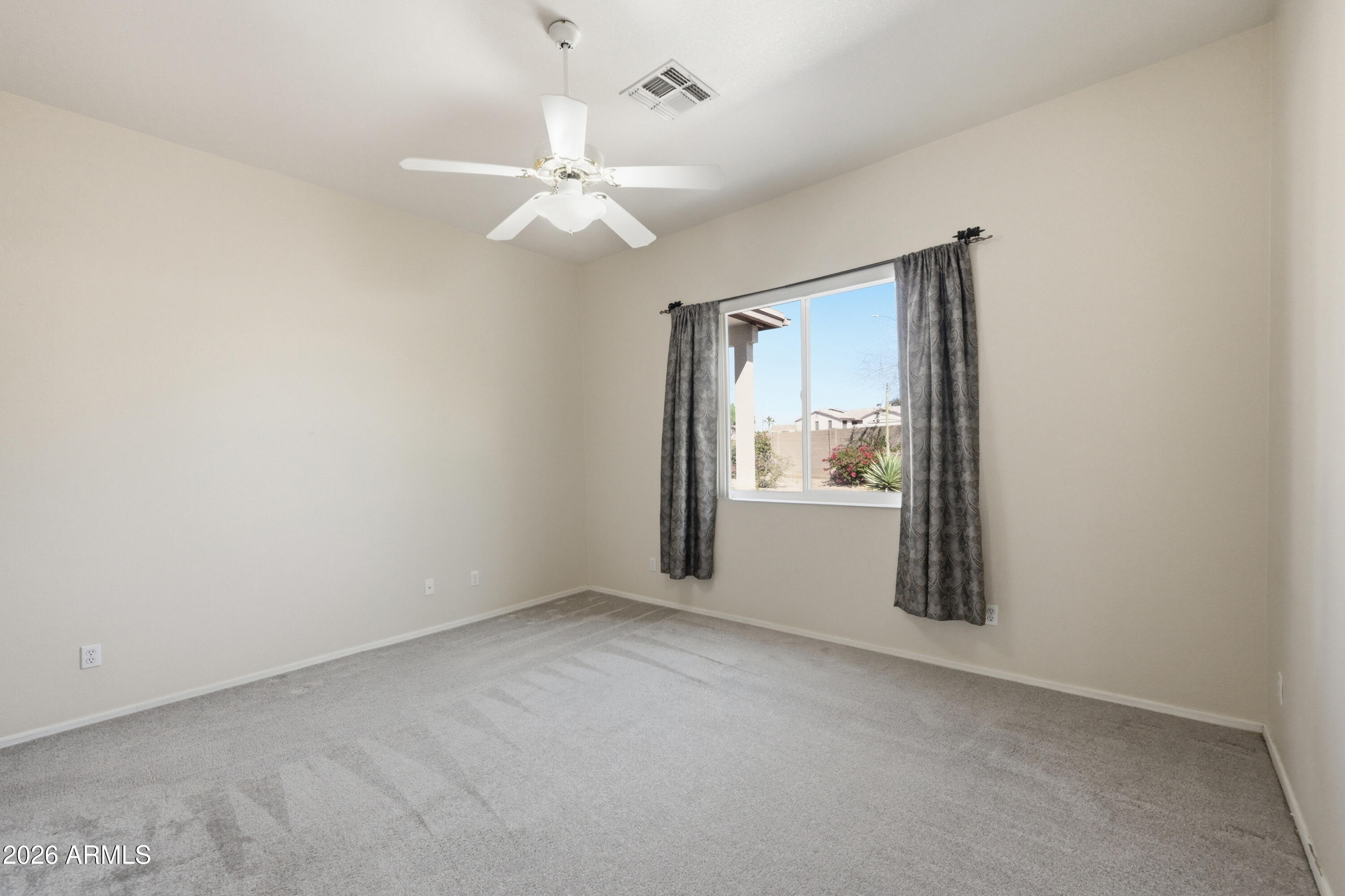 10873 W ORAIBI Drive