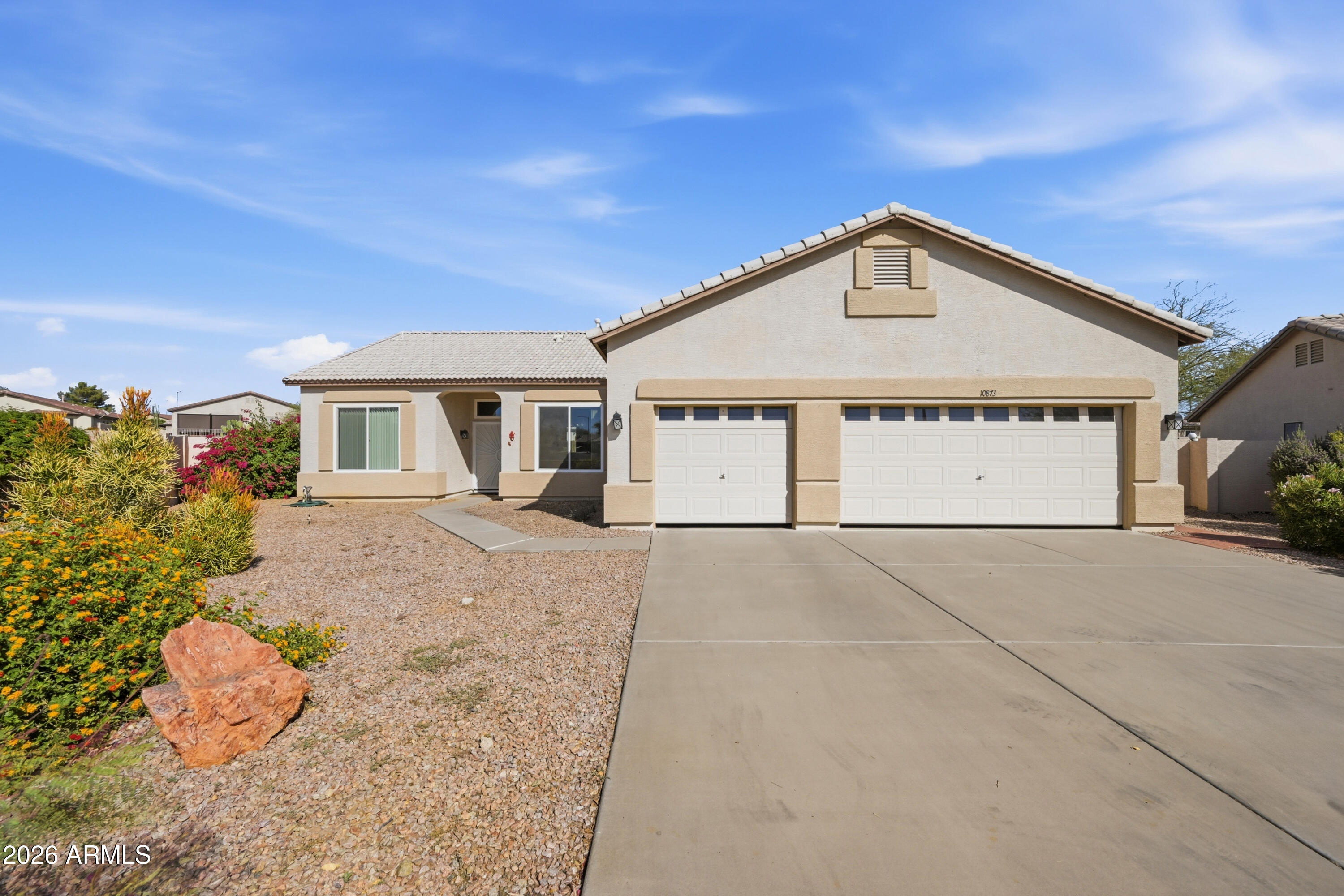 10873 W ORAIBI Drive