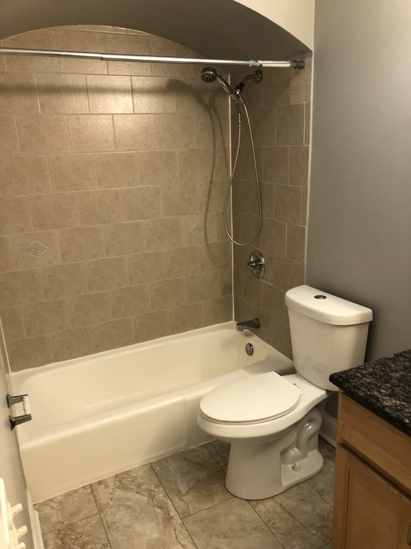 4933 N East River Road Unit: 1A