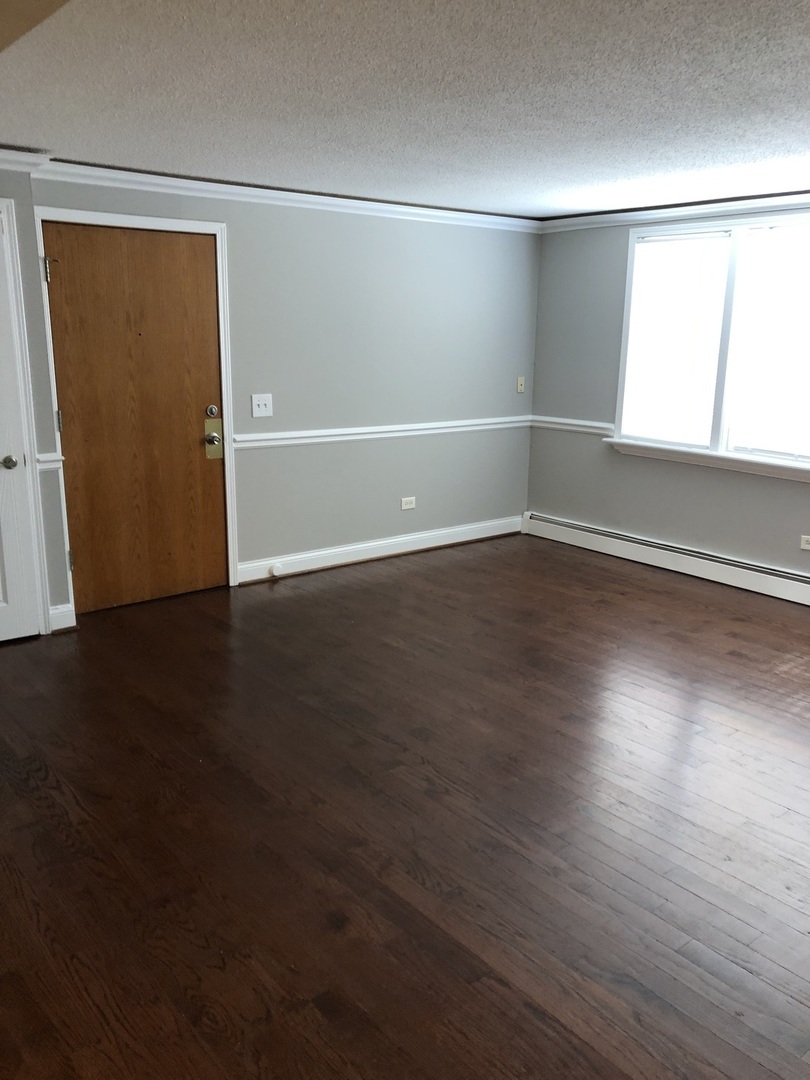 4933 N East River Road Unit: 1A