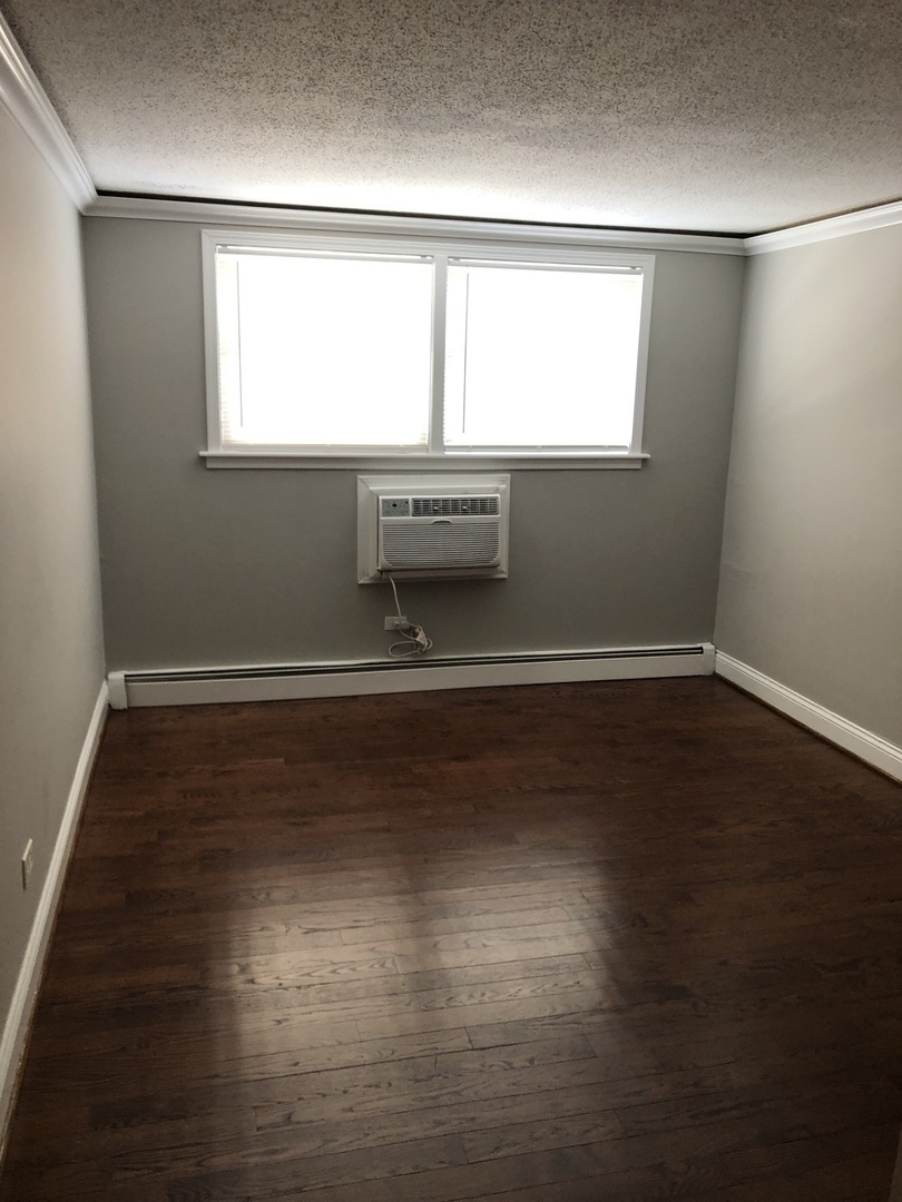 4933 N East River Road Unit: 1A