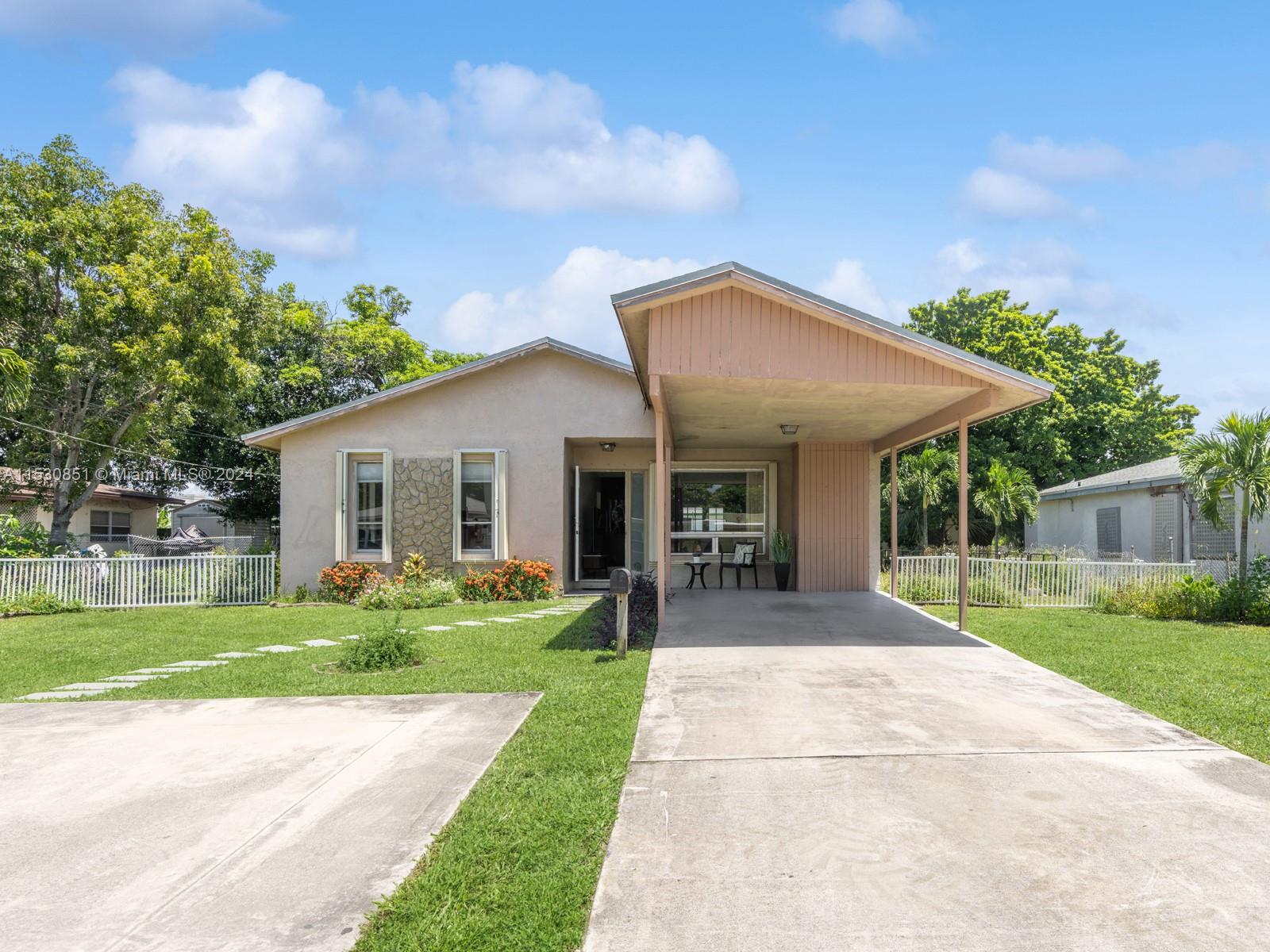 704 NW 3rd Ave