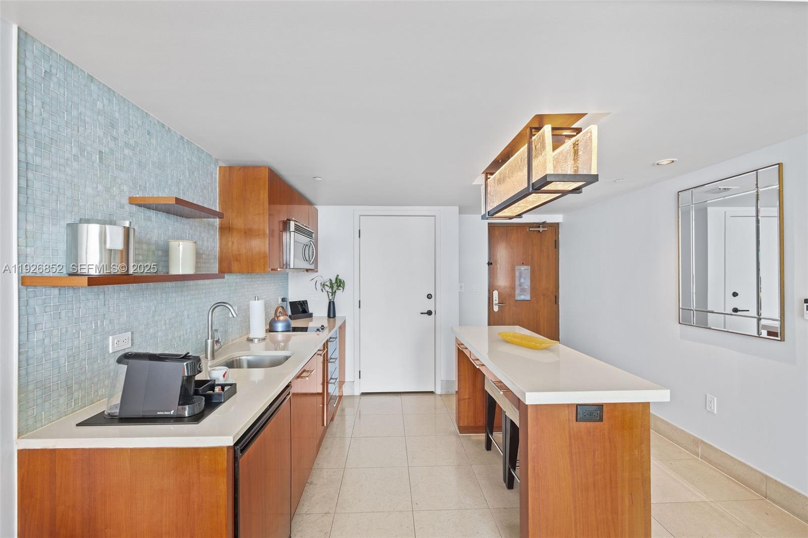 6801 Collins Ave Unit: 614 (legal 609)
