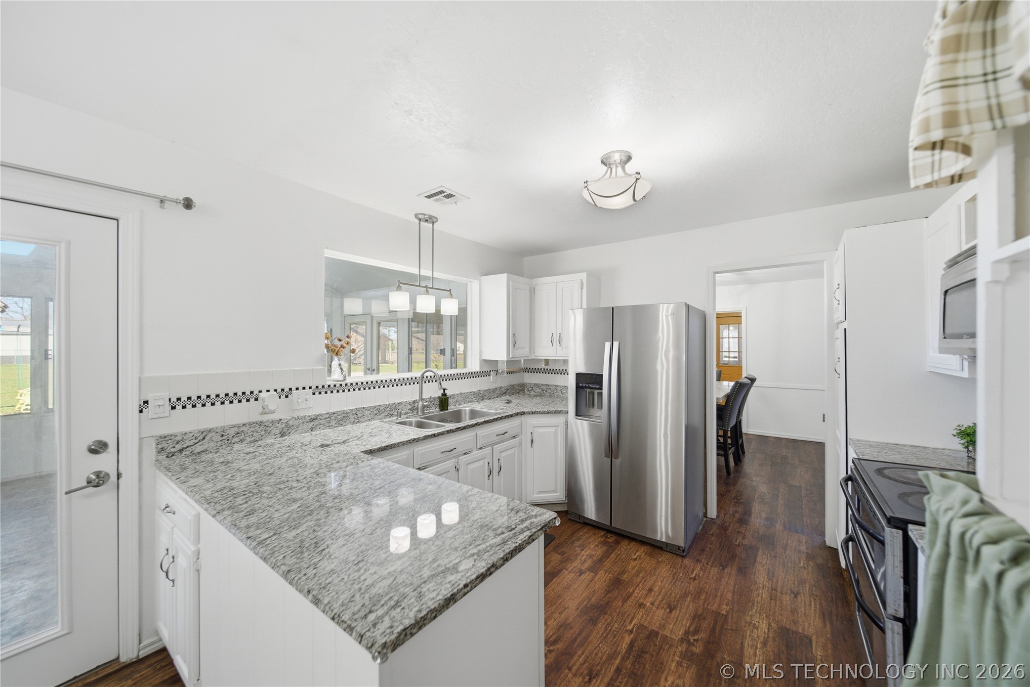 9211 N 155th East Avenue N