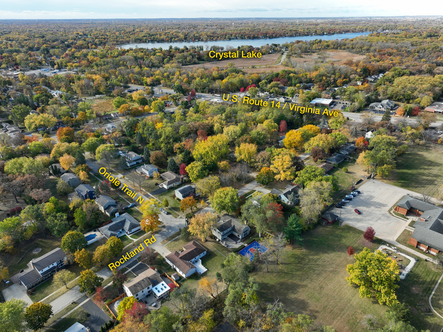 Aerial view of the Rockland Road neighborhood, with autumn trees, Crystal Lake, and nearby roads labeled.