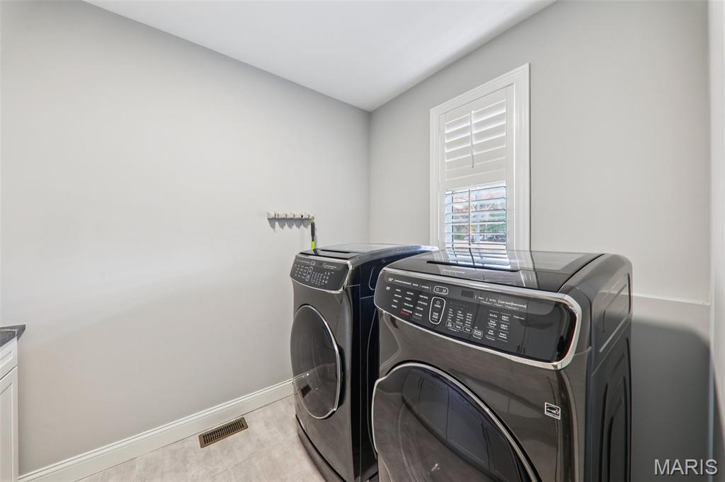 115 Ladue Pine Woods Place