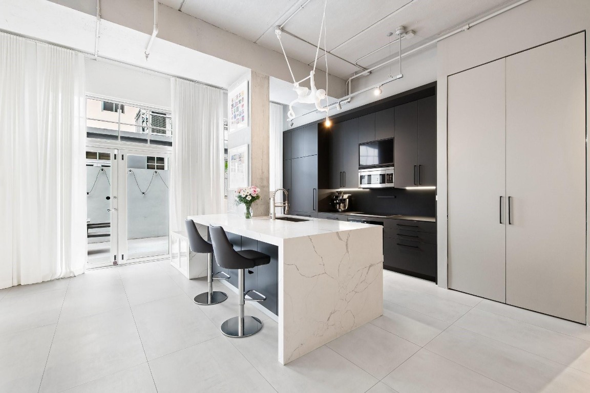 425 N Andrews Ave 206