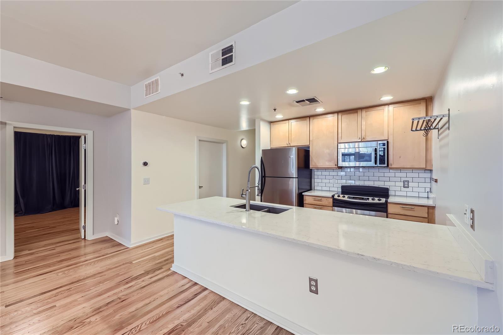 275 S Harrison Street Unit: 107