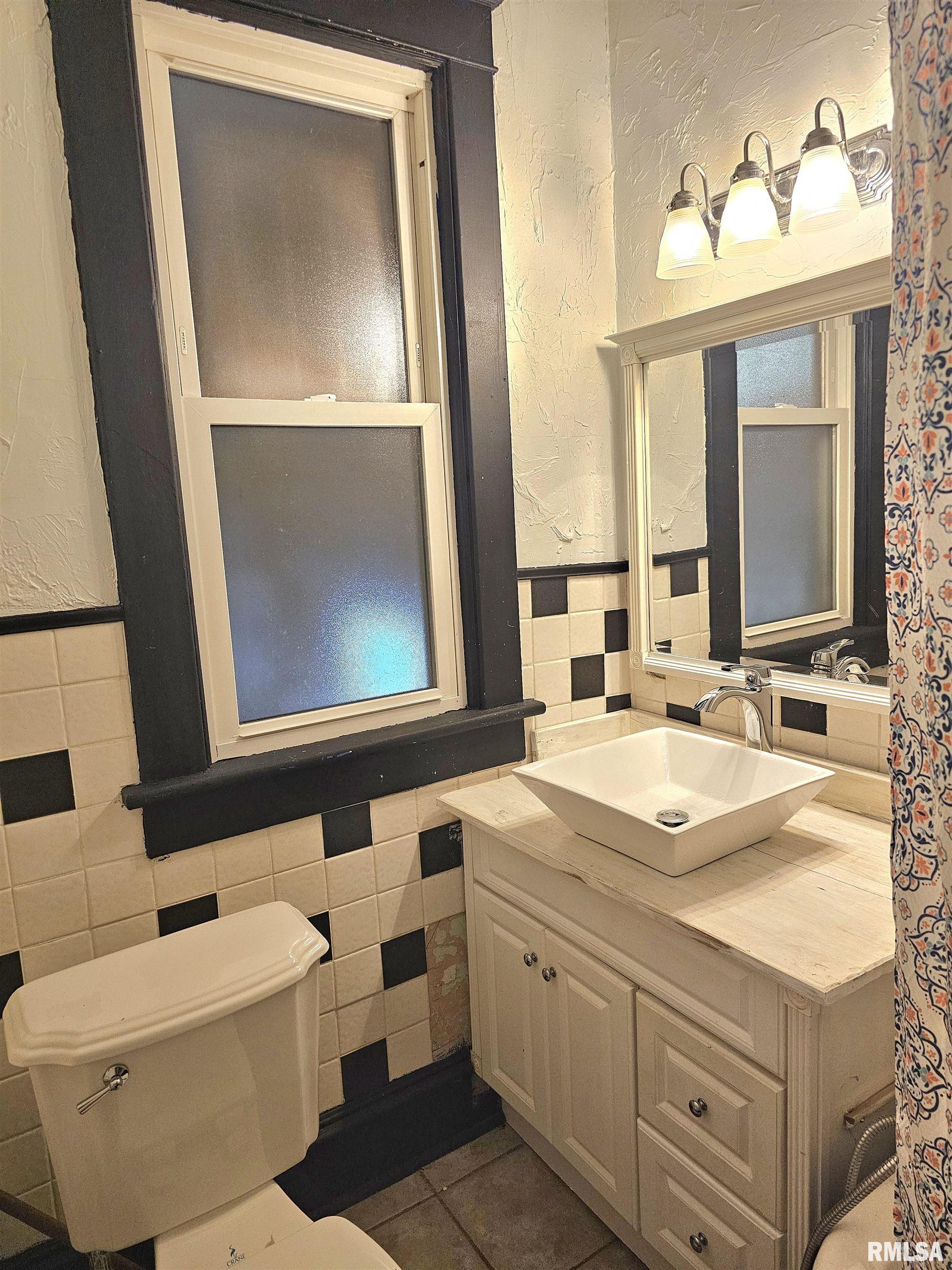 616 N SHERMAN Street