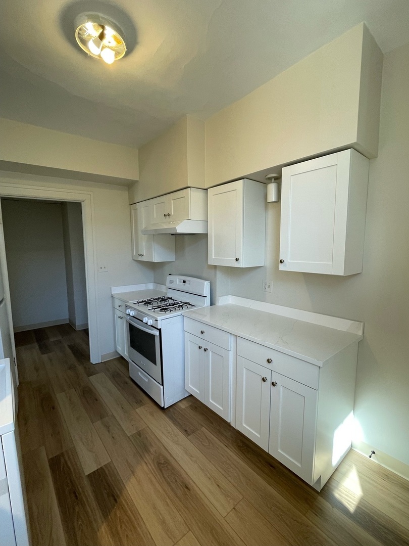 103 E 1 ST Street Unit: 2S