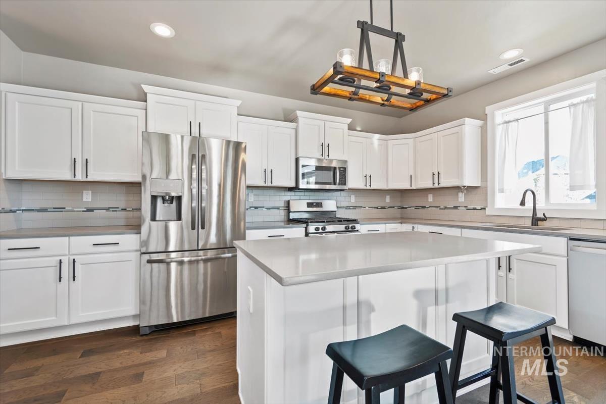 12534 W Oneida St.