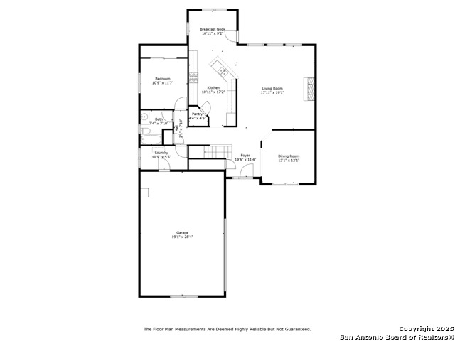 Floor plan showing a bedroom, kitchen, living and dining rooms, garage, and breakfast nook.