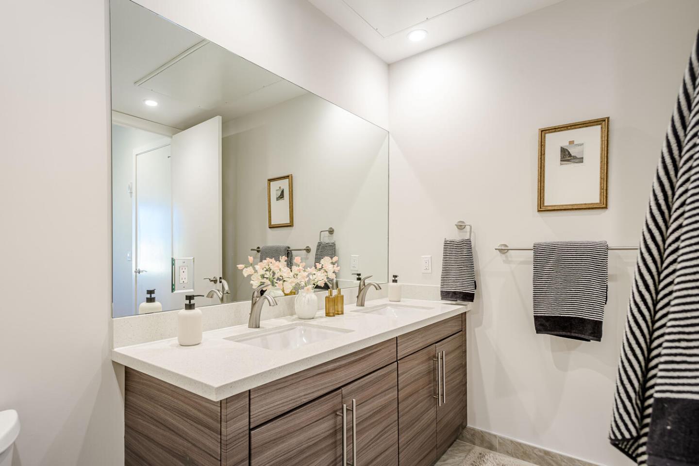Elegant Condo Living with Abundant Light in Prime Location