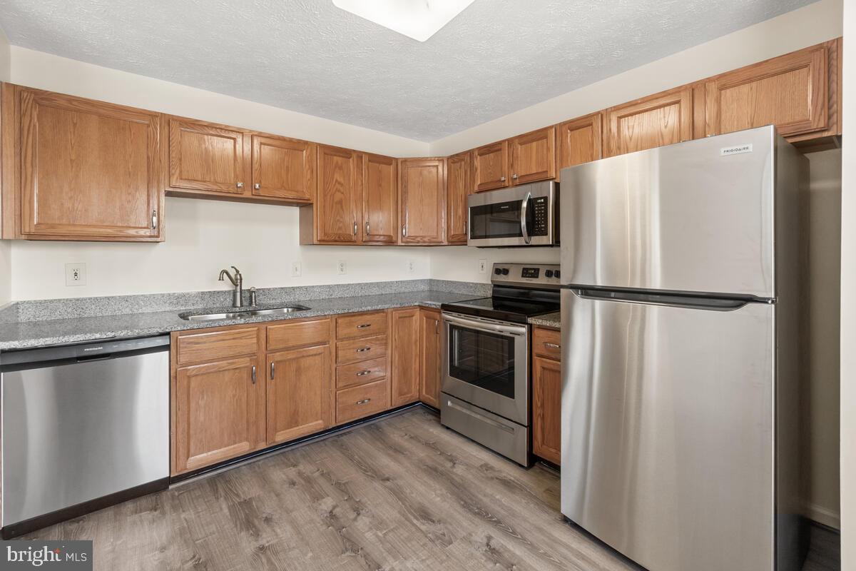 6413 Weatherby Court Unit: H