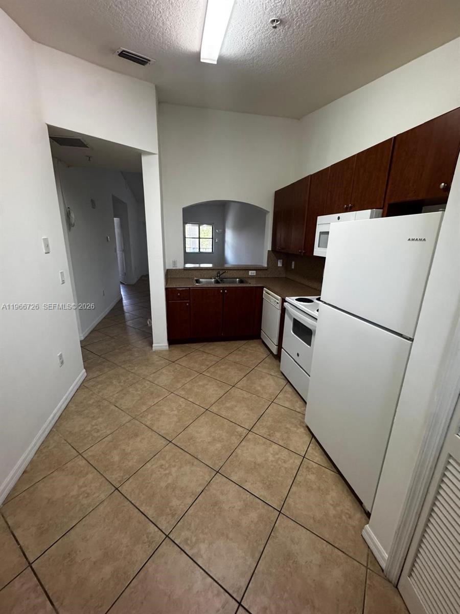 22621 SW 88th Pl # 8 Unit: 302-8