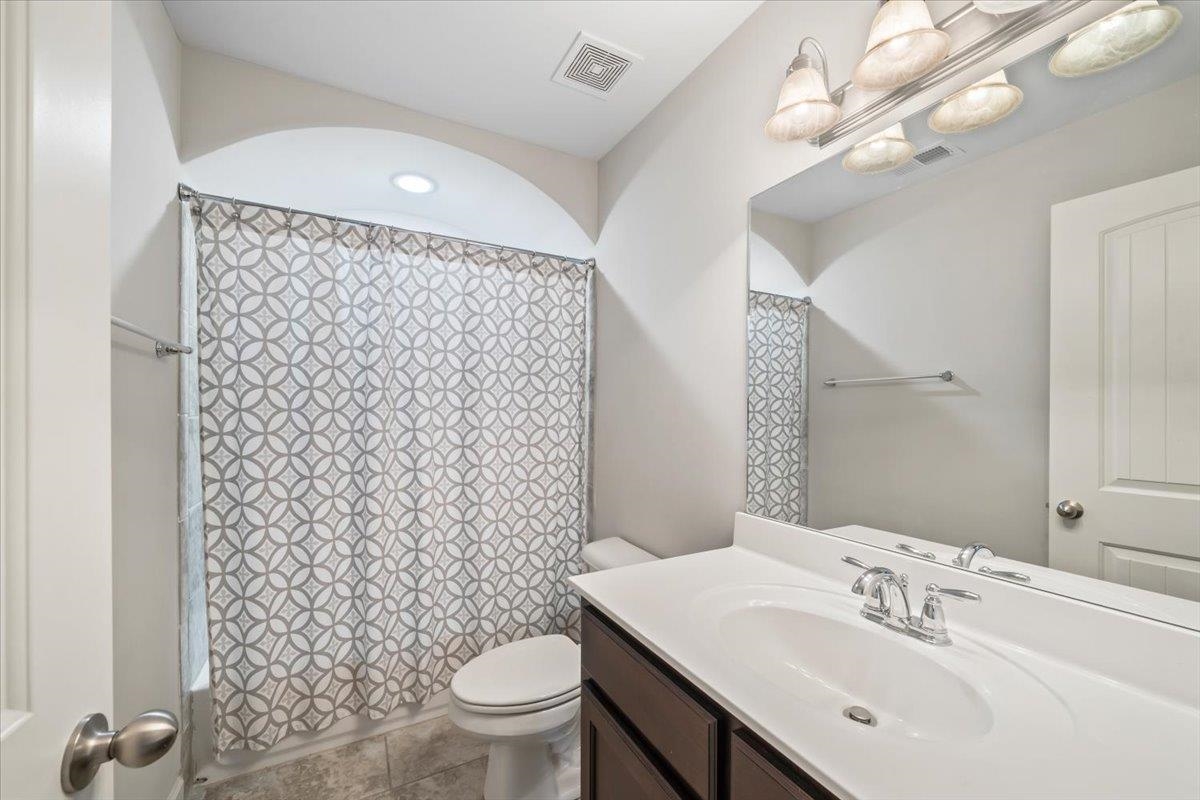 6303 CREEKSIDE LAKE DR