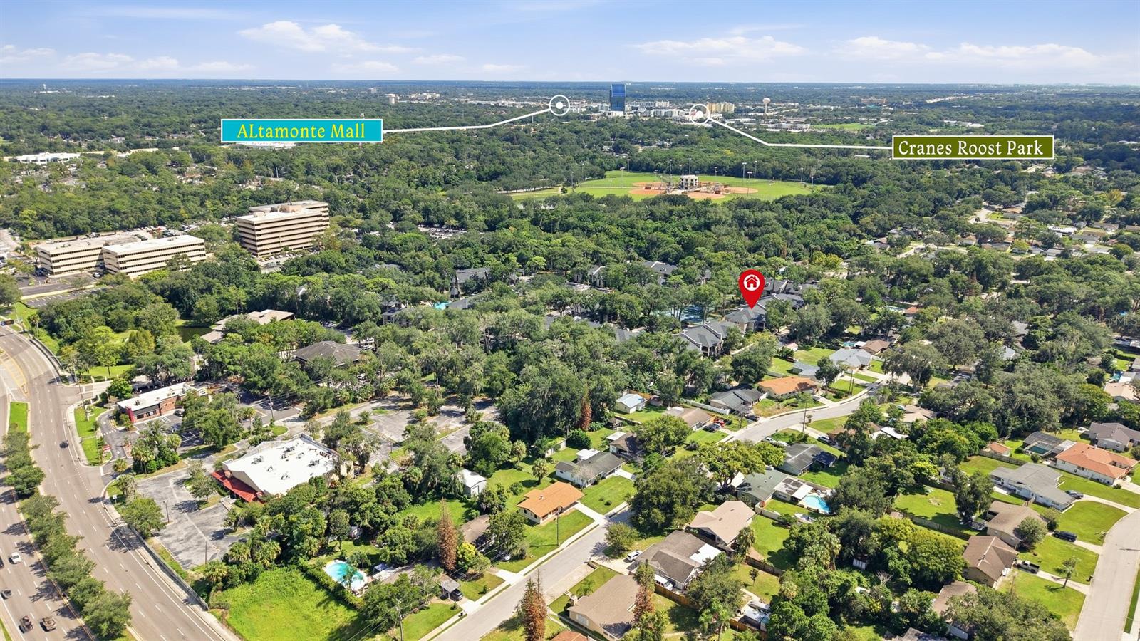 Aerial neighborhood view with the property marked among tree-lined streets, near Altamonte Mall and Cranes Roost Park.