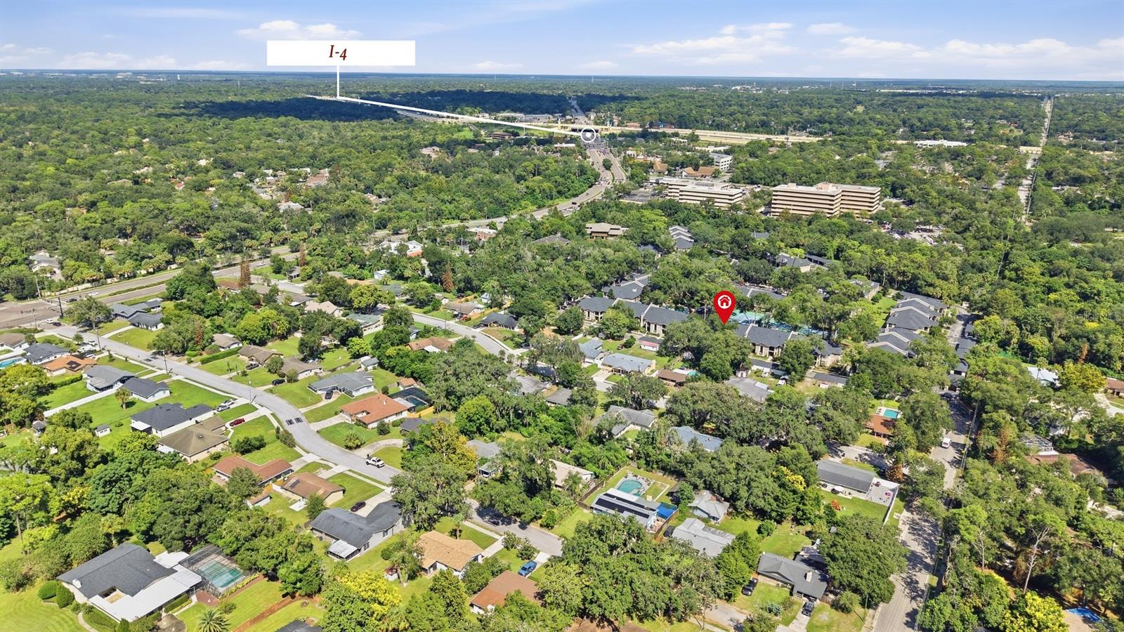 Aerial view of the neighborhood, with the home marked near Interstate 4.