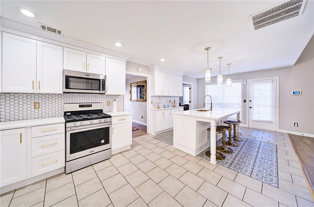 208 Five Iron Court NW